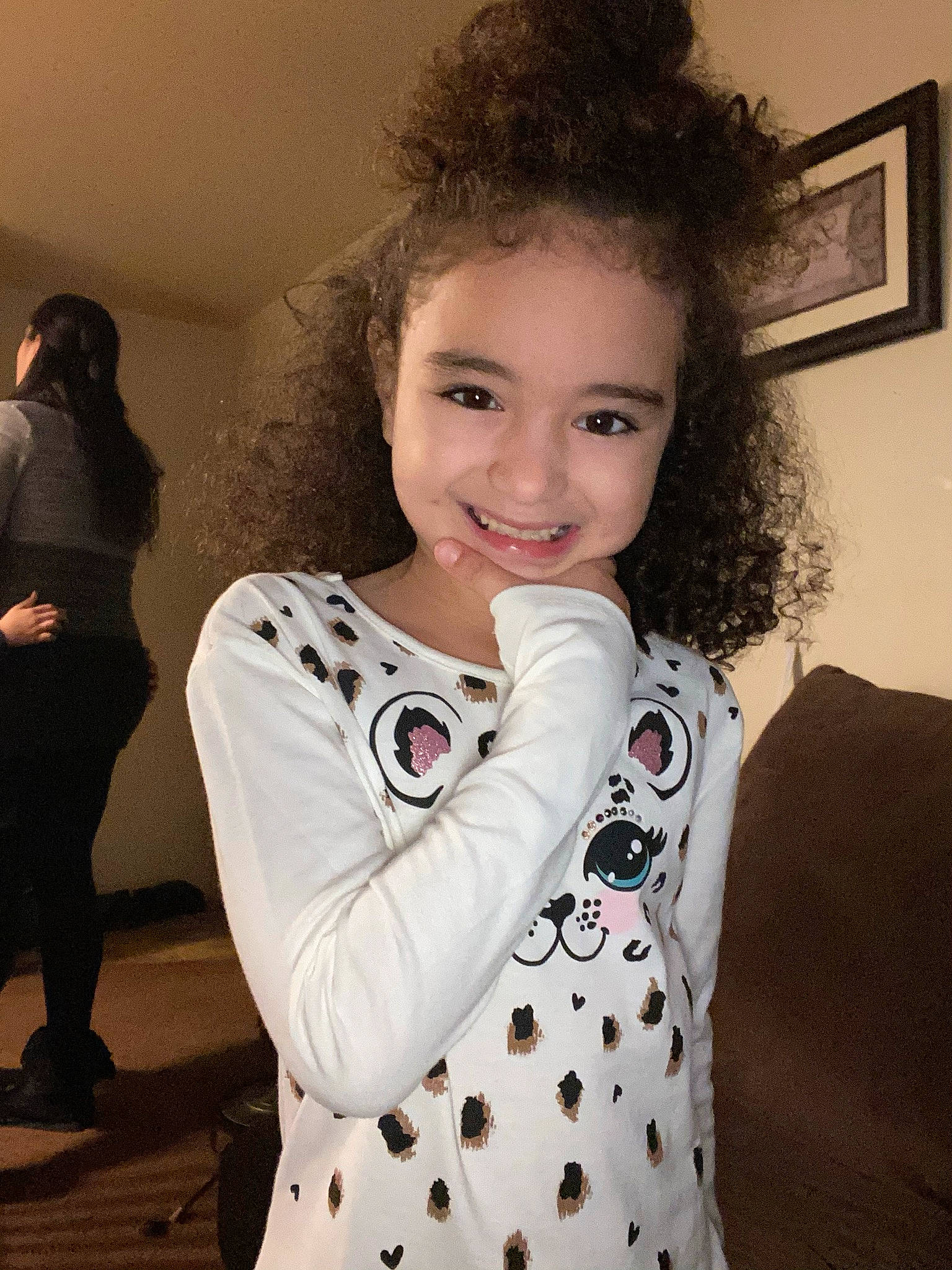 Emma is registered to the contest to win money with this photo: boot, eye, fashion_design, flash_photography, fun, gesture, hair, hairstyle, happy, human_body, iris, joy, lip, neck, person, picture_frame, shoulder, skin, sleeve, smile