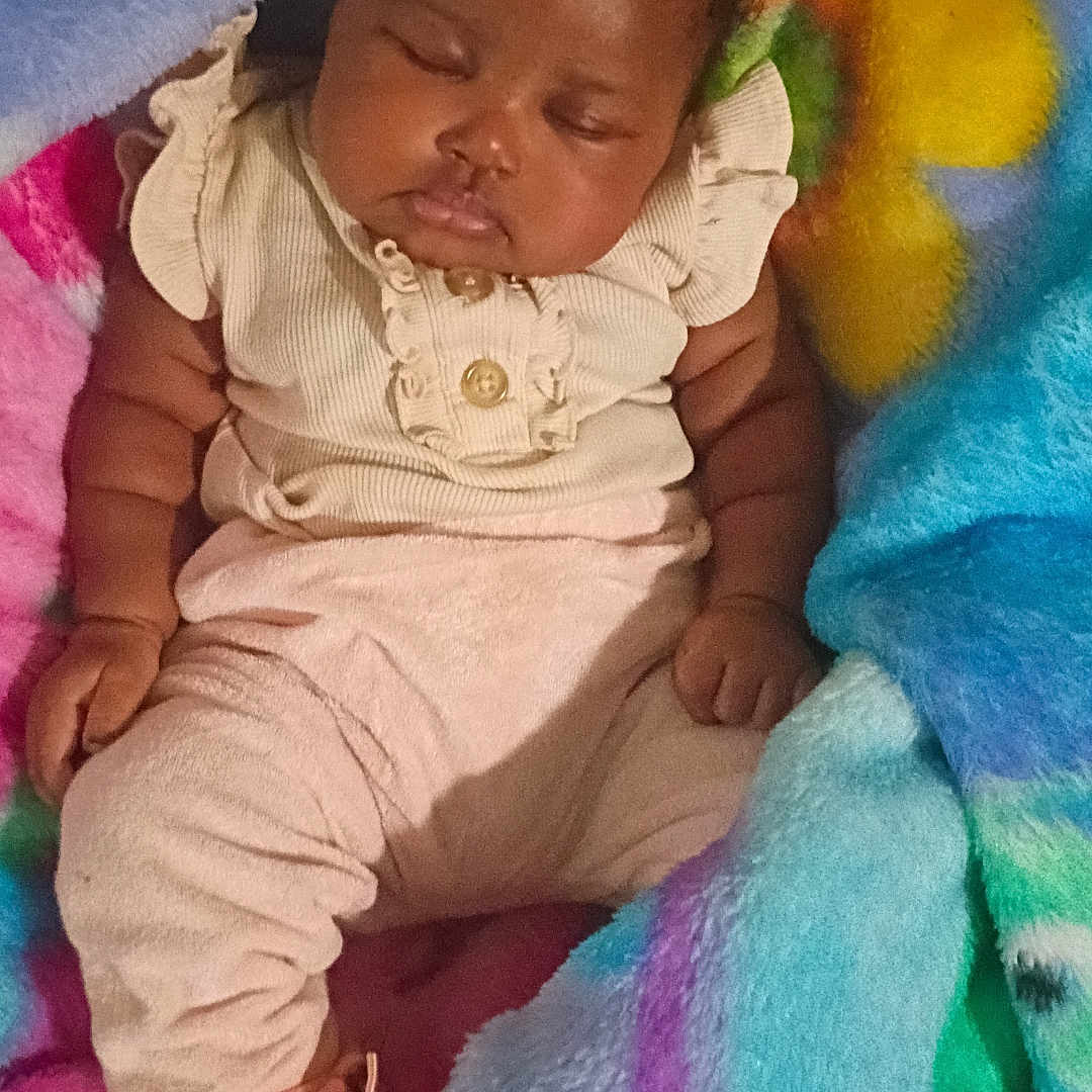 Rose joined the competition — help win amazing prizes! baby, sleeping, blanket, colorful, soft, cozy, infant, cute, peaceful, clothing, pink, patterned, child, resting, warm, indoors, portrait, small, adorable, comfort