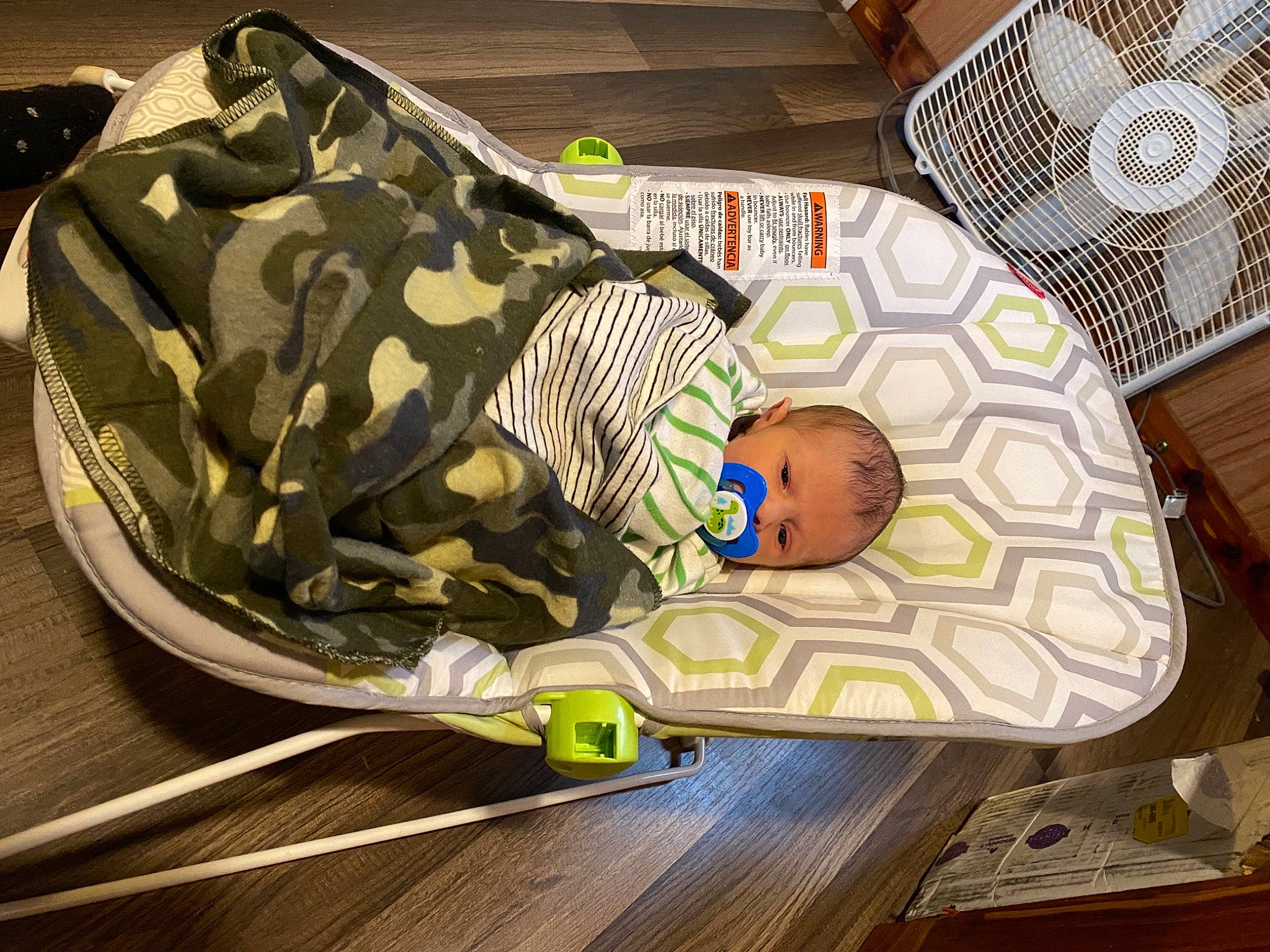Chase joined the competition — help win amazing prizes! baby, baby_products, baby_safety, baby_toddler_clothing, camouflage, child, comfort, couch, flooring, hardwood, infant_bed, linens, mechanical_fan, military_camouflage, nap, pattern, person, room, sleep, toddler