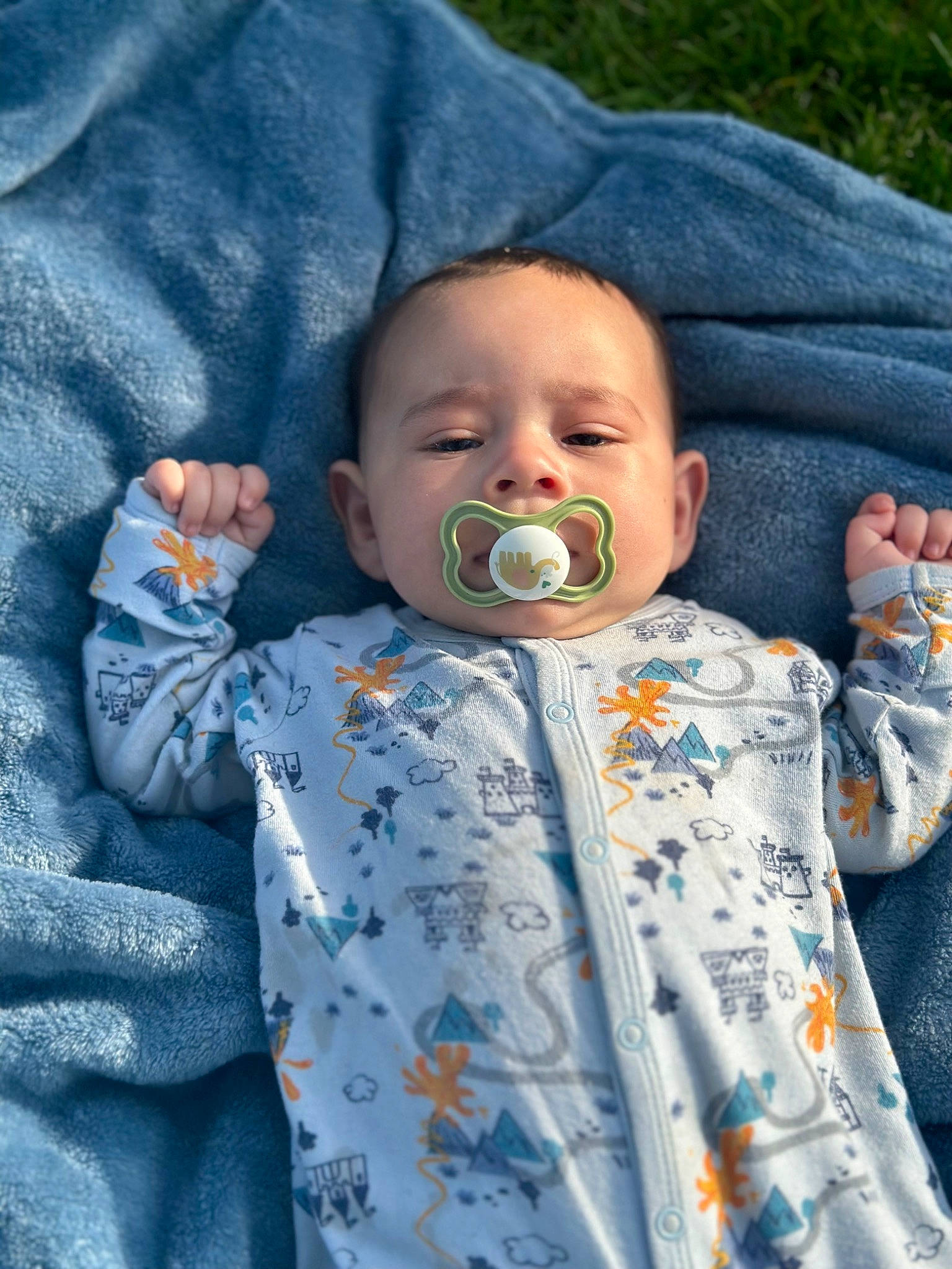 Kannon is registered to the contest to win money with this photo: baby, baby_products, baby_toddler_clothing, cheek, child, chin, eye, grass, happy, head, human_body, iris, lip, mouth, nose, outerwear, person, skin, sleeve, toddler