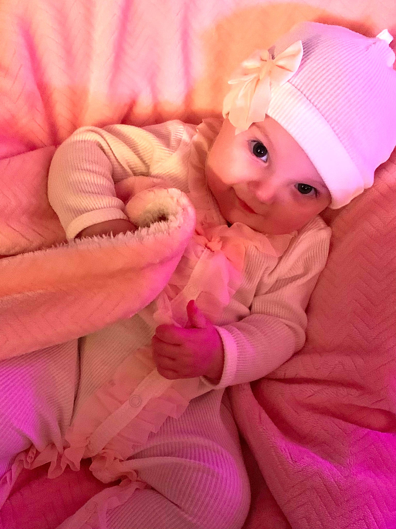 Addelyn joined the competition — help win amazing prizes! baby, baby_toddler_clothing, cap, cheek, child, comfort, finger, fur, happy, hat, headgear, headwear, human_body, magenta, outerwear, peach, person, pink, skin, sleeve