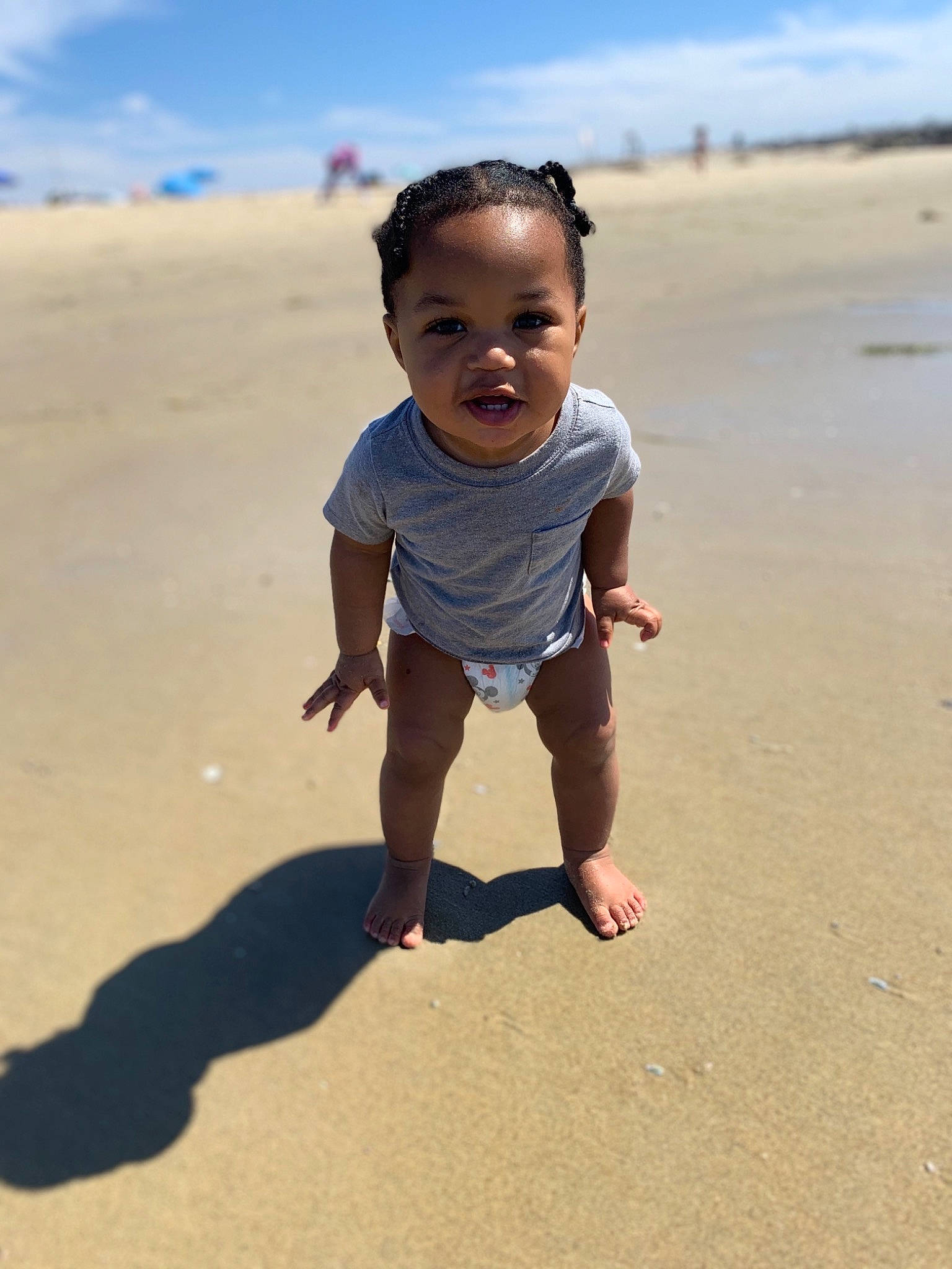 Sire-domani joined the competition — help win amazing prizes! baby_toddler_clothing, barefoot, beach, body_of_water, cloud, ecoregion, fun, happy, landscape, leisure, mammal, natural_environment, people_in_nature, people_on_beach, person, sky, standing, sunlight, toddler, travel