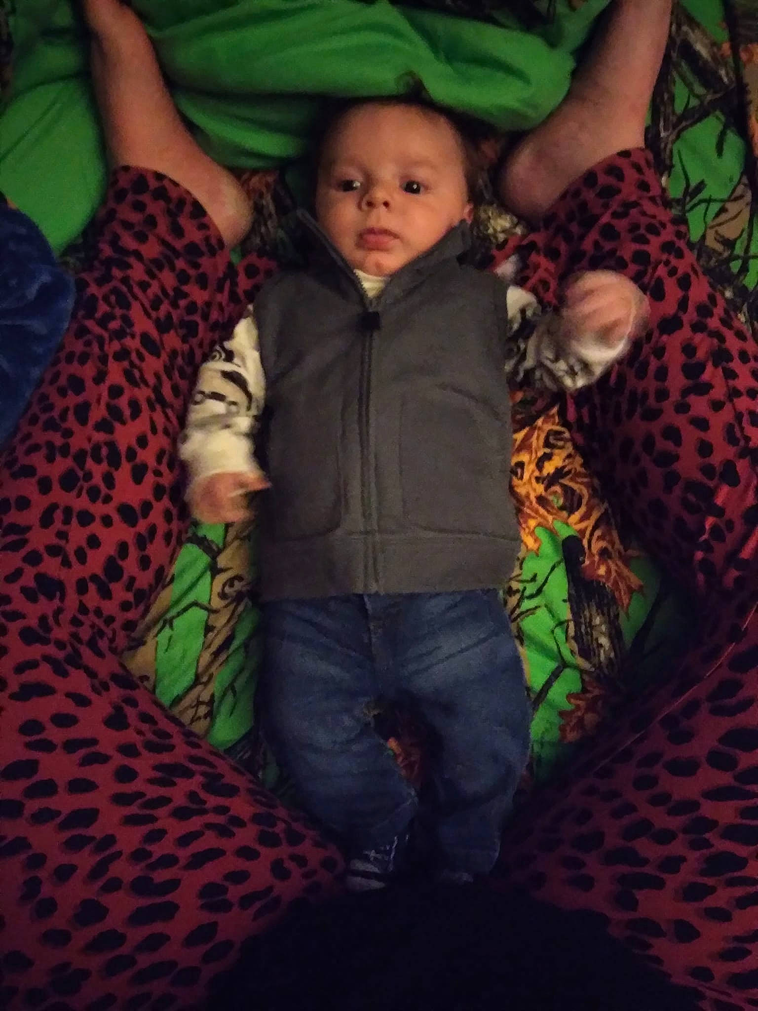 Owen joined the competition — help win amazing prizes! baby, child, comfort, darkness, fun, fur, gesture, grass, green, happy, leaf, linens, night, pattern, person, room, sitting, textile, tints_and_shades, toddler