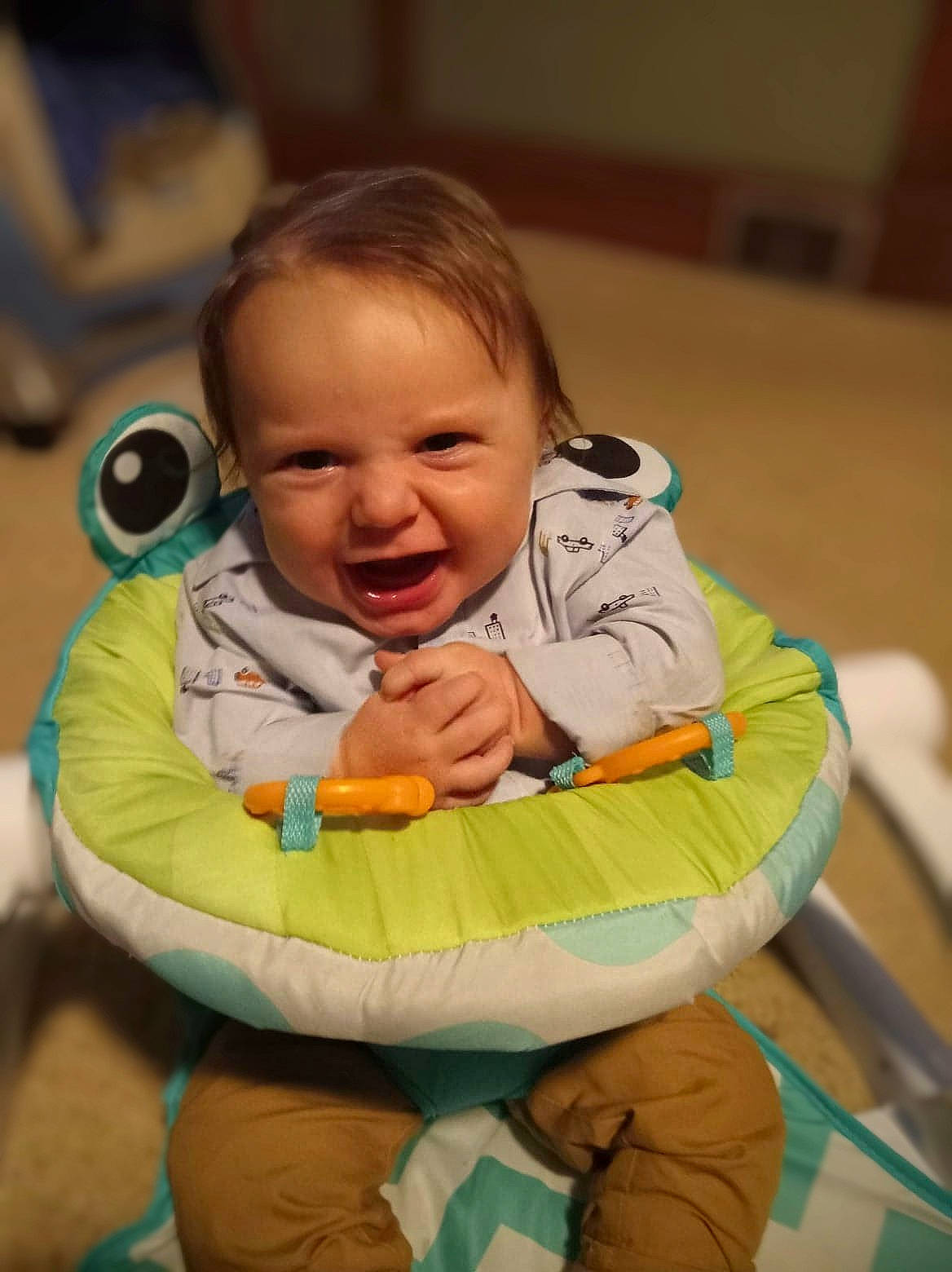 Owen is registered to the contest to win money with this photo: baby, baby_products, baby_toddler_clothing, bib, chair, cheek, child, comfort, face, flooring, fun, happy, head, leisure, person, room, sitting, skin, smile, toddler