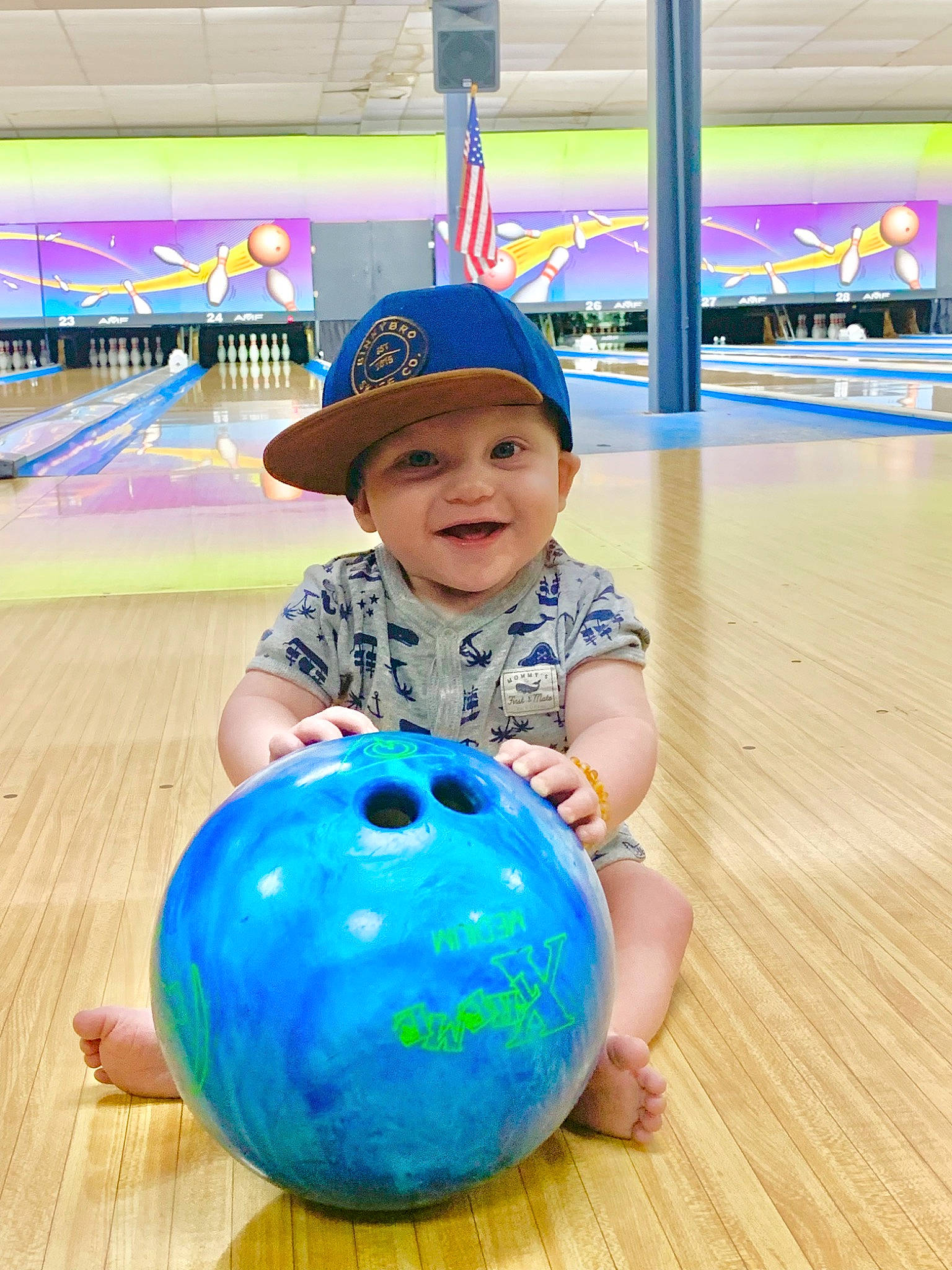 Easton joined the competition — help win amazing prizes! ball, bowling, bowling_equipment, child, electric_blue, fun, happy, headgear, headwear, joy, leisure, light, person, photograph, recreation, smile, sports_equipment, toddler, wheel, white