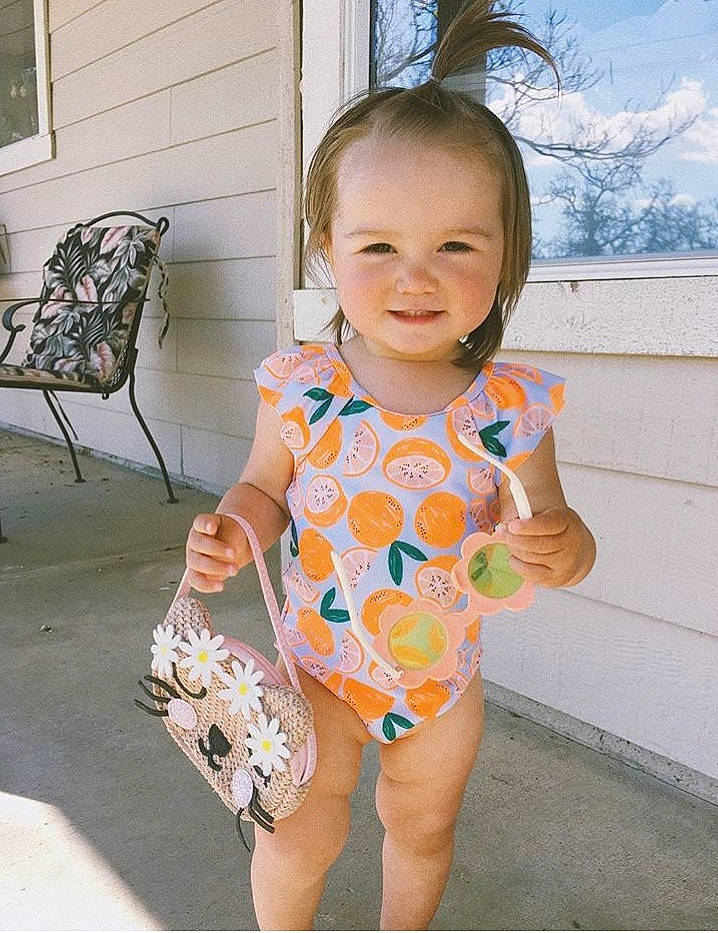 Rowyn is registered to the contest to win money with this photo: baby_toddler_clothing, child, clothing, design, dress, joy, pattern, person, shorts, sleeve, smile, summer, toddler, vacation, yellow