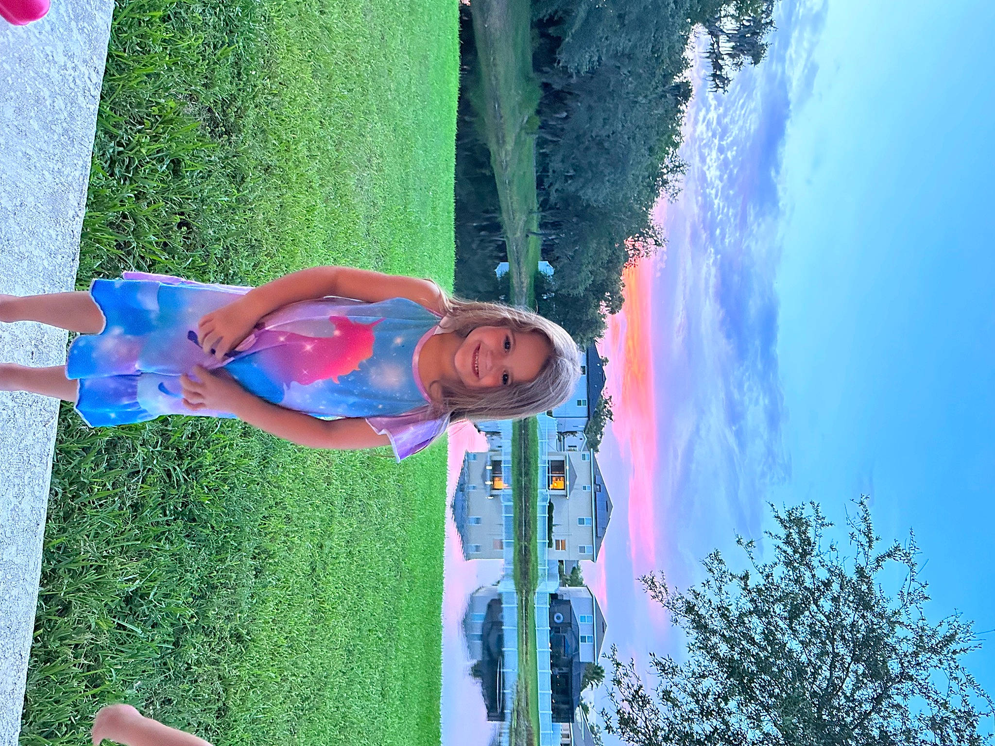 Everleigh is registered to the contest to win money with this photo: azure, beauty, blue, cloud, daytime, electric_blue, fun, grass, green, happy, joy, leisure, people_in_nature, person, plant, sky, smile, t_shirt, tree, vacation