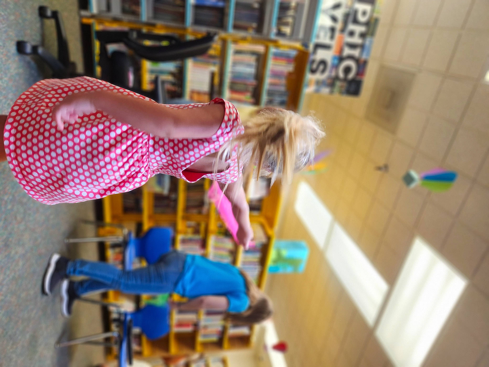 Clayton joined the competition — help win amazing prizes! animation, chair, child, doll, dress, event, fashion_design, flooring, fun, hardwood, human_leg, leisure, magenta, person, recreation, room, shelf, sportswear, toy, visual_arts