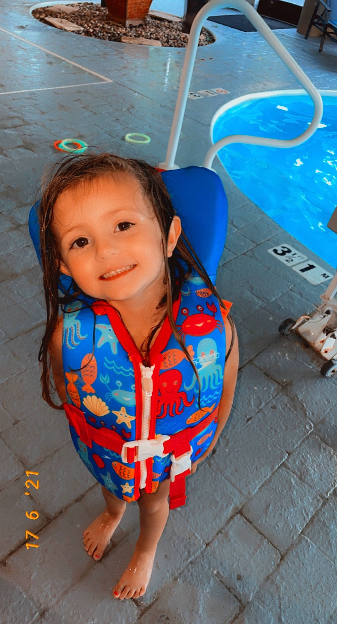 Jacquelyn is registered to the contest to win money with this photo: aqua, azure, black_hair, blue, chin, cool, face, facial_expression, floor, flooring, fun, happy, joy, leaf, leisure, mouth, person, public_space, road_surface, skin