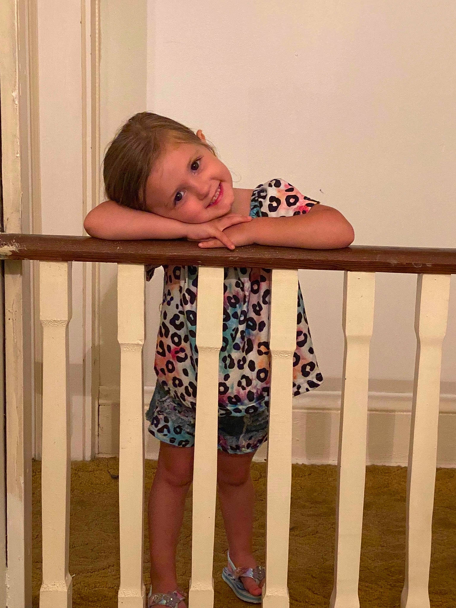 Jacquelyn is registered to the contest to win money with this photo: baby_toddler_clothing, child, comfort, elbow, fun, happy, human_leg, joy, knee, pattern, person, product, shorts, sitting, sleeve, standing, t_shirt, textile, thigh, toddler