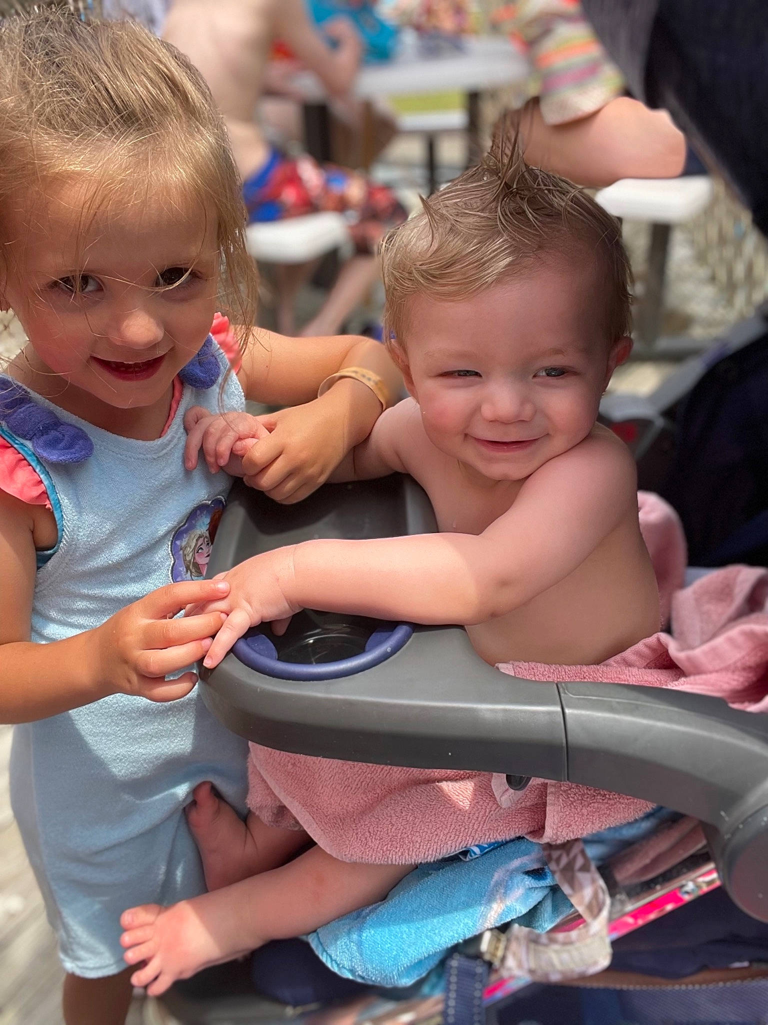 Cameron is registered to the contest to win money with this photo: baby, baby_toddler_clothing, beauty, blue, child, event, facial_expression, finger, fun, hand, happy, head, joy, leisure, person, product, recreation, sitting, skin, smile