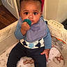 Kiyear joined the competition — help win amazing prizes! baby, child, pacifier, crib, blanket, teddy_bear, cloud, moon, blue_clothing, bib, socks, indoor, floor, door, curly_hair, person, infant, cute, seated, looking_at_camera