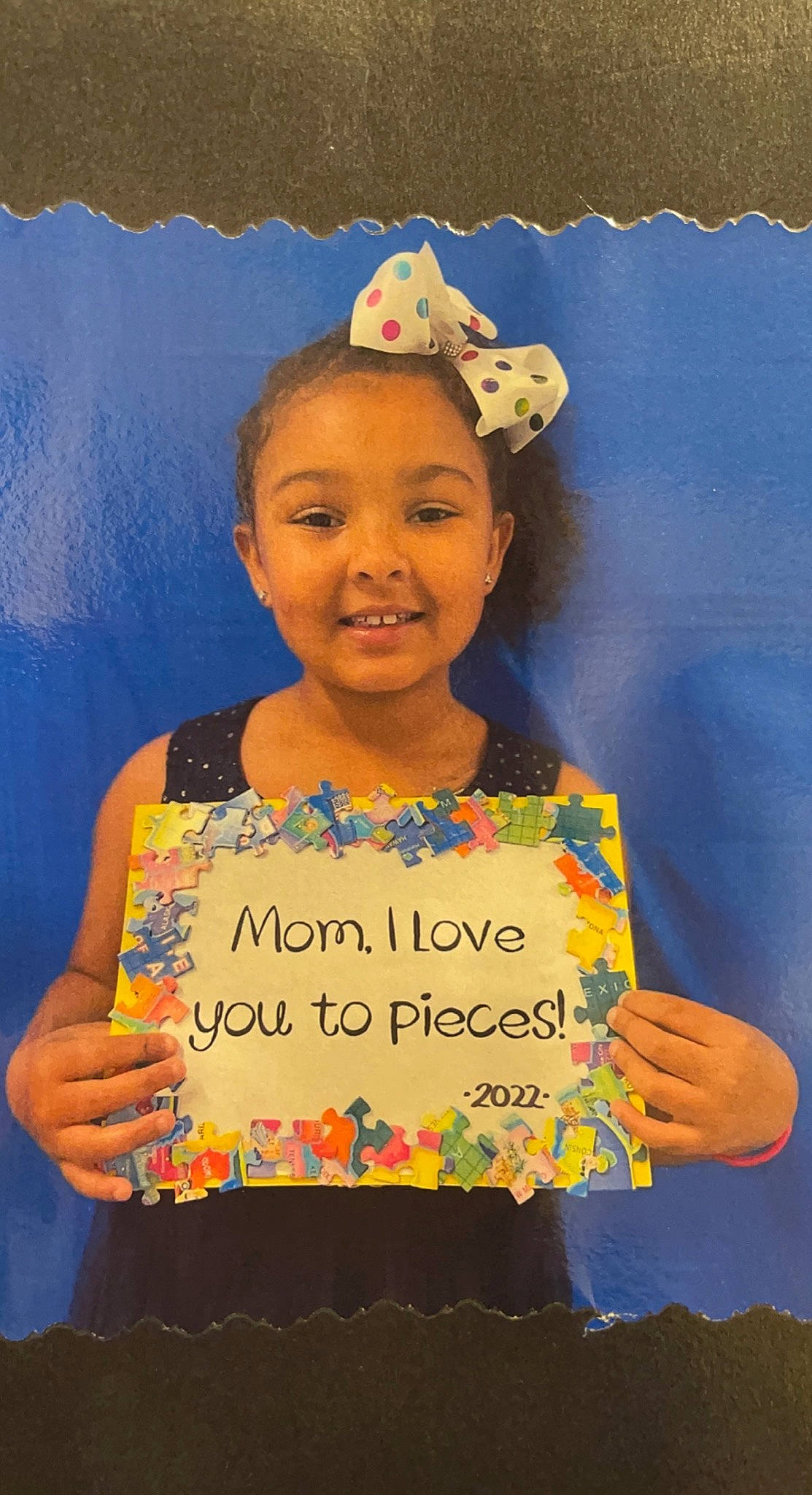 Mia Malone is registered to the contest to win money with this photo: birthday, child, costume_hat, event, font, fun, handwriting, happy, hat, headgear, joy, necklace, organ, party, party_supply, person, smile, t_shirt, toddler