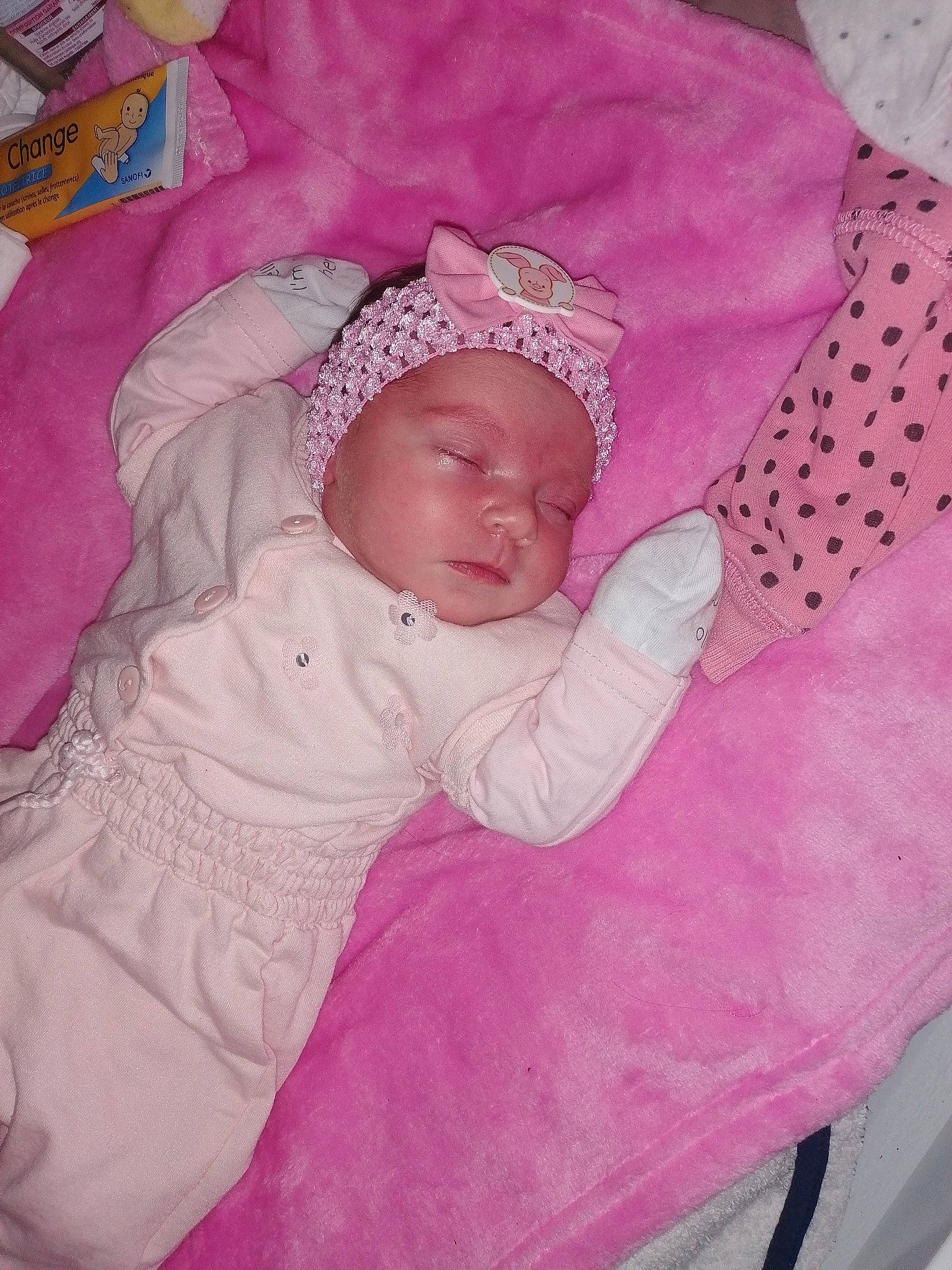 Lëana participe au concours pour gagner de l'argent avec cette photo : baby, baby_products, baby_sleeping, baby_toddler_clothing, bedtime, cheek, child, clothing, comfort, eye, headgear, headwear, iris, linens, magenta, person, pink, product, purple, skin