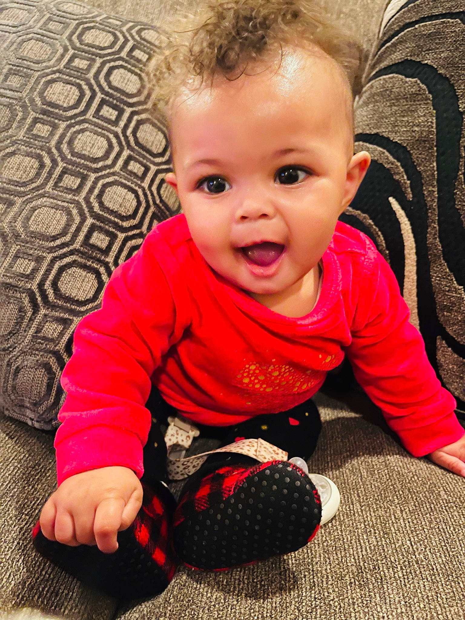 Tylaiah joined the competition — help win amazing prizes! baby, baby_toddler_clothing, cheek, child, floor, flooring, grass, happy, human_body, iris, mammal, nose, person, red, skin, sleeve, smile, standing, toddler, vertebrate