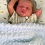 Harrison joined the competition — help win amazing prizes! arm, baby, bed, blanket, child, comfort, cute, dinosaur_pattern, face, head, indoors, infant, newborn, pajamas, peaceful, portrait, resting, sleeping, soft_texture, toddler