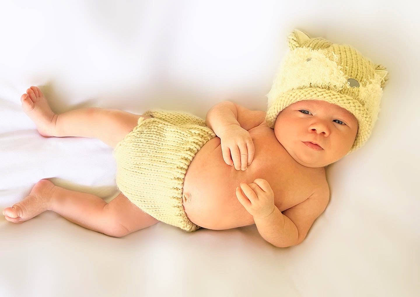 Adan joined the competition — help win amazing prizes! abdomen, art, baby, baby_sleeping, baby_toddler_clothing, barefoot, child, comfort, diaper, finger, foot, headwear, human_body, human_leg, knee, person, skin, stomach, thigh, toddler