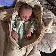 Luis participe au concours pour gagner de l'argent avec cette photo : baby, sleeping, onesie, blanket, soft, cozy, infant, child, cute, face, hand, pillow, fabric, indoor, portrait, newborn, comfort, rest, warm, relaxation