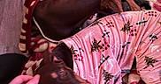 Juniper joined the competition — help win amazing prizes! dog, doberman, blanket, pajamas, hand, floor, indoor, pet, cozy, brown, fur, animal, sleeping, resting, comfort, patterned_clothing, human_hand, wood_floor, christmas_tree_pattern, relaxation