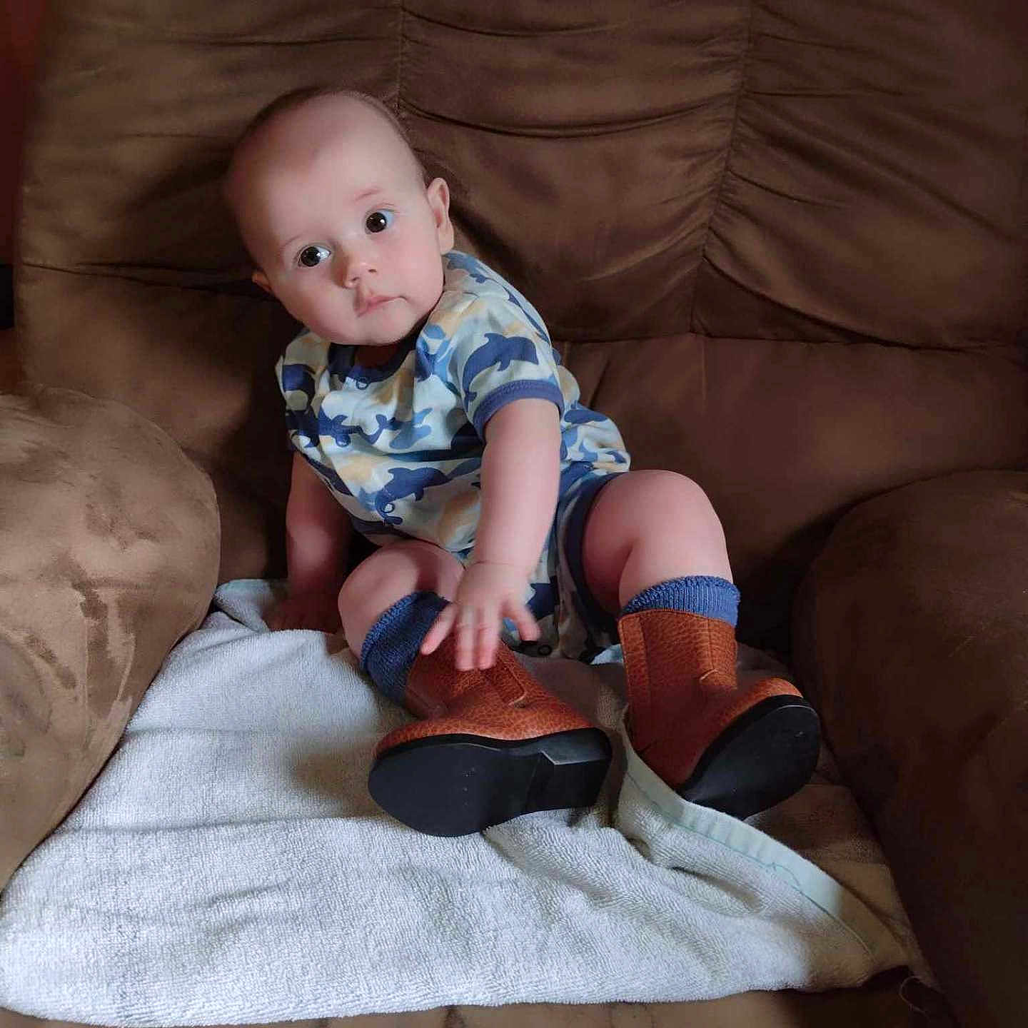 Isiah Howard joined the competition — help win amazing prizes! baby, chair, clothing, couch, cushion, face, footwear, furniture, head, homedecor, hosiery, pants, person, photography, portrait, shoe, shorts, sitting, sock, toy