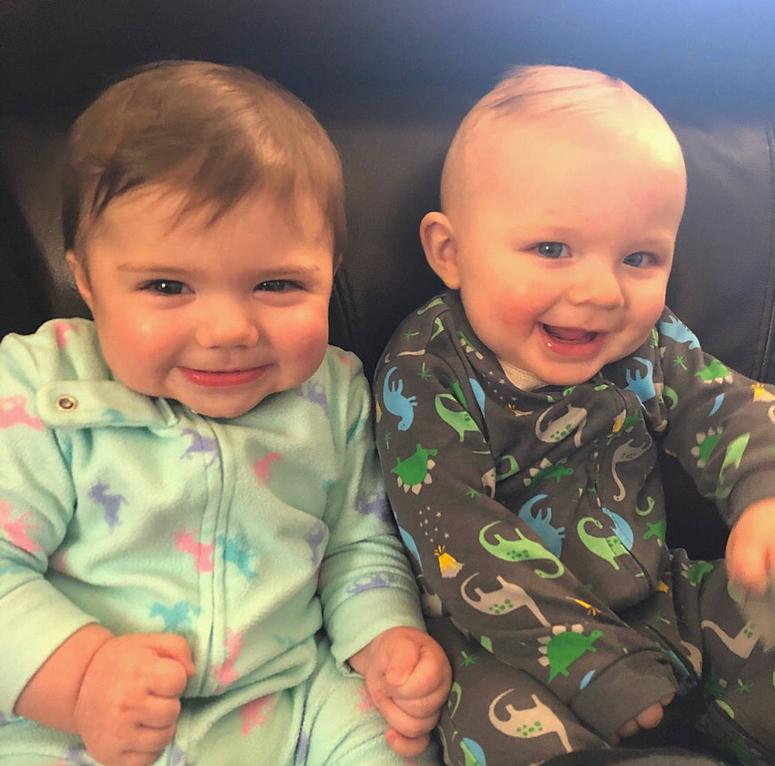 Gina is registered to the contest to win money with this photo: baby, cheek, child, chin, cool, electronic_device, eye, face, facial_expression, happy, head, human, iris, joy, nose, people, person, play, sibling, skin