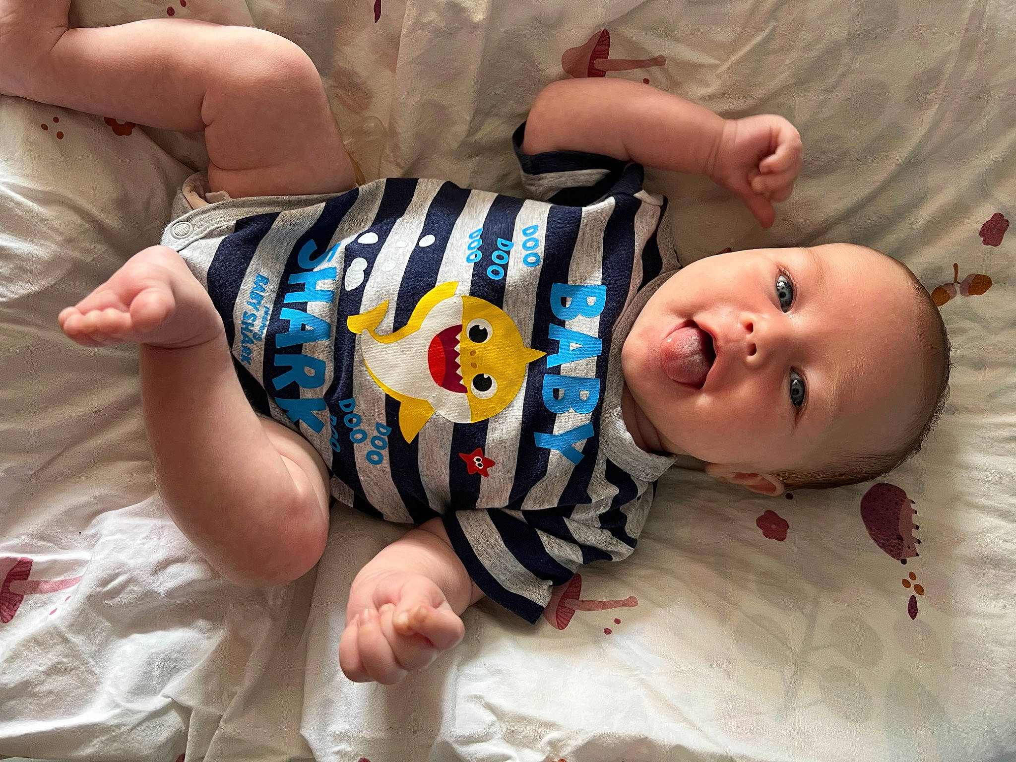 Eleanor is registered to the contest to win money with this photo: baby, baby_products, baby_toddler_clothing, cheek, child, comfort, eye, finger, foot, fun, happy, mouth, pattern, person, product, skin, sleeve, smile, textile, thumb