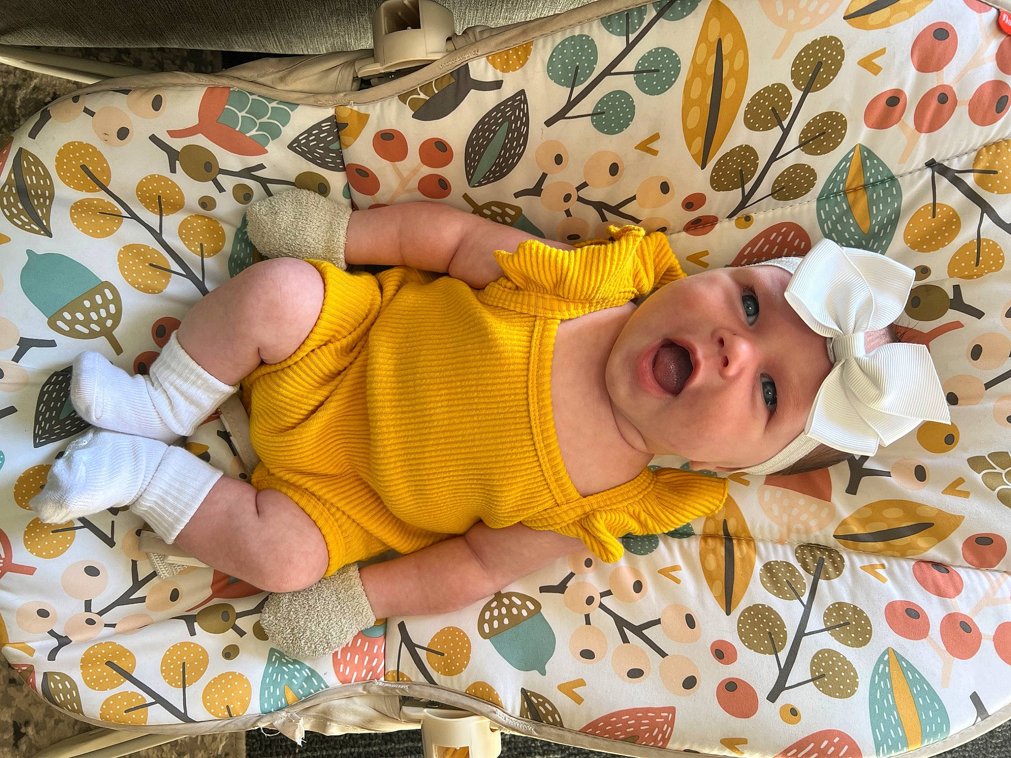 Eleanor joined the competition — help win amazing prizes! abdomen, baby, baby_products, baby_sleeping, baby_toddler_clothing, bedding, bedtime, child, comfort, happy, head, headwear, human_leg, infant_bodysuit, linens, pattern, person, room, smile, textile