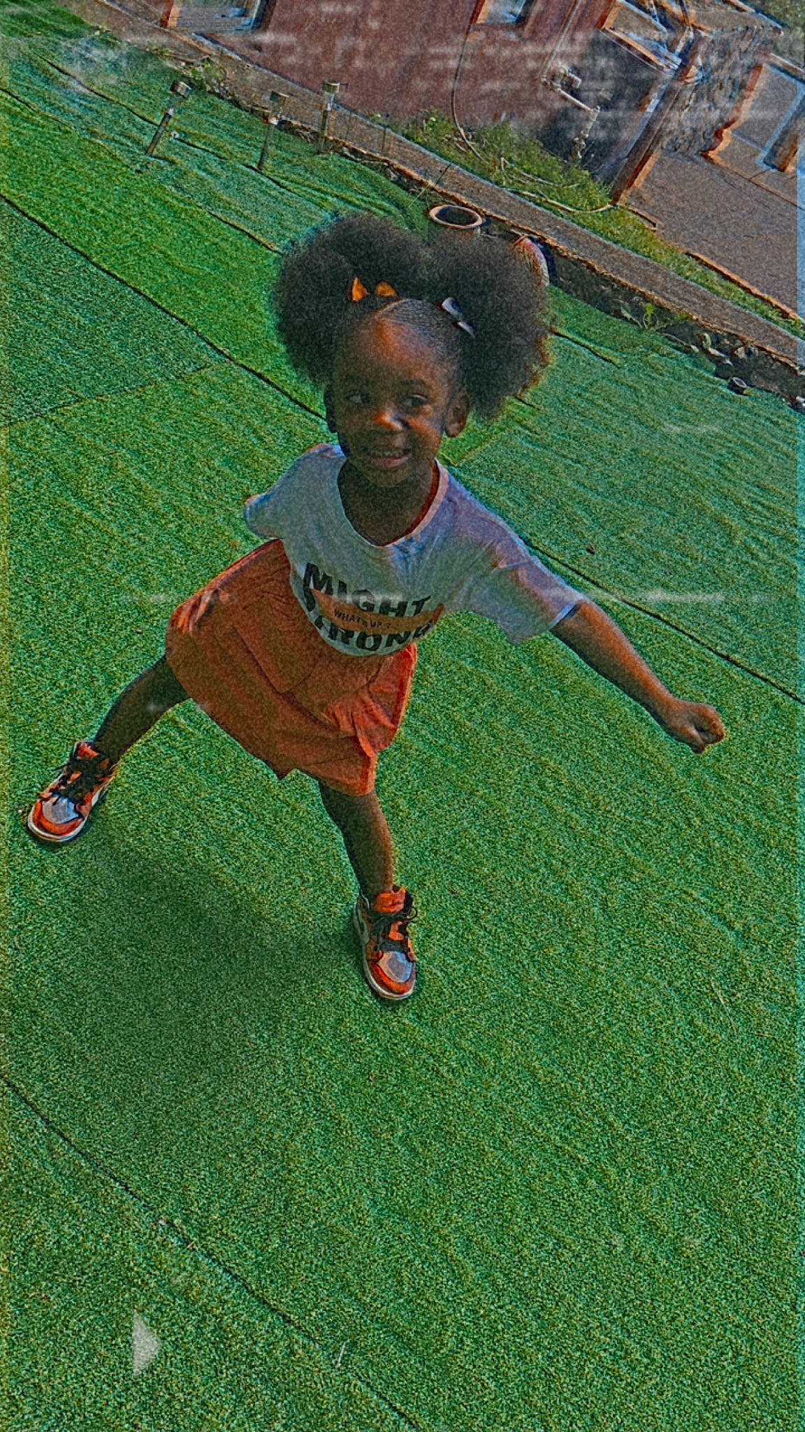 Janei is registered to the contest to win money with this photo: baby_toddler_clothing, competition_event, flooring, fun, grass, grass_family, green, happy, joy, lawn, leisure, mesh, net, people_in_nature, person, player, playing_sports, recreation, smile, sports