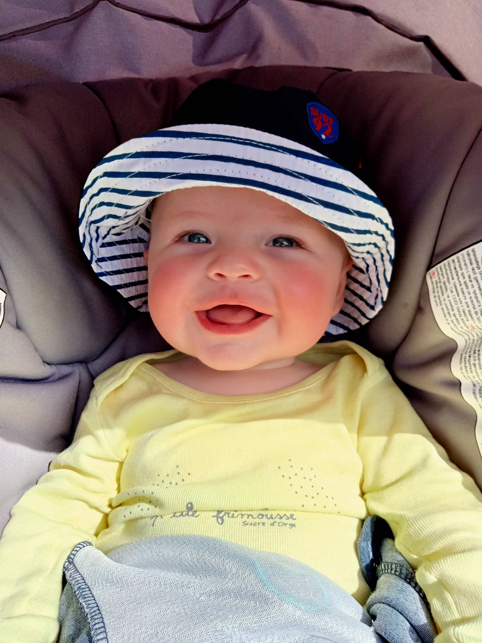 Nathys participe au concours pour gagner de l'argent avec cette photo : baby, baby_toddler_clothing, cap, cheek, child, chin, comfort, eye, eyebrow, happy, hat, headgear, headwear, iris, lip, mammal, person, product, skin, smile