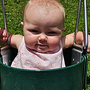 Izabella-Mae joined the competition — help win amazing prizes! baby, child, swing, outdoor, playground, grass, metal, chain, smile, face, cheeks, sunlight, summer, clothing, pink, person, happy, infant, seat, nature