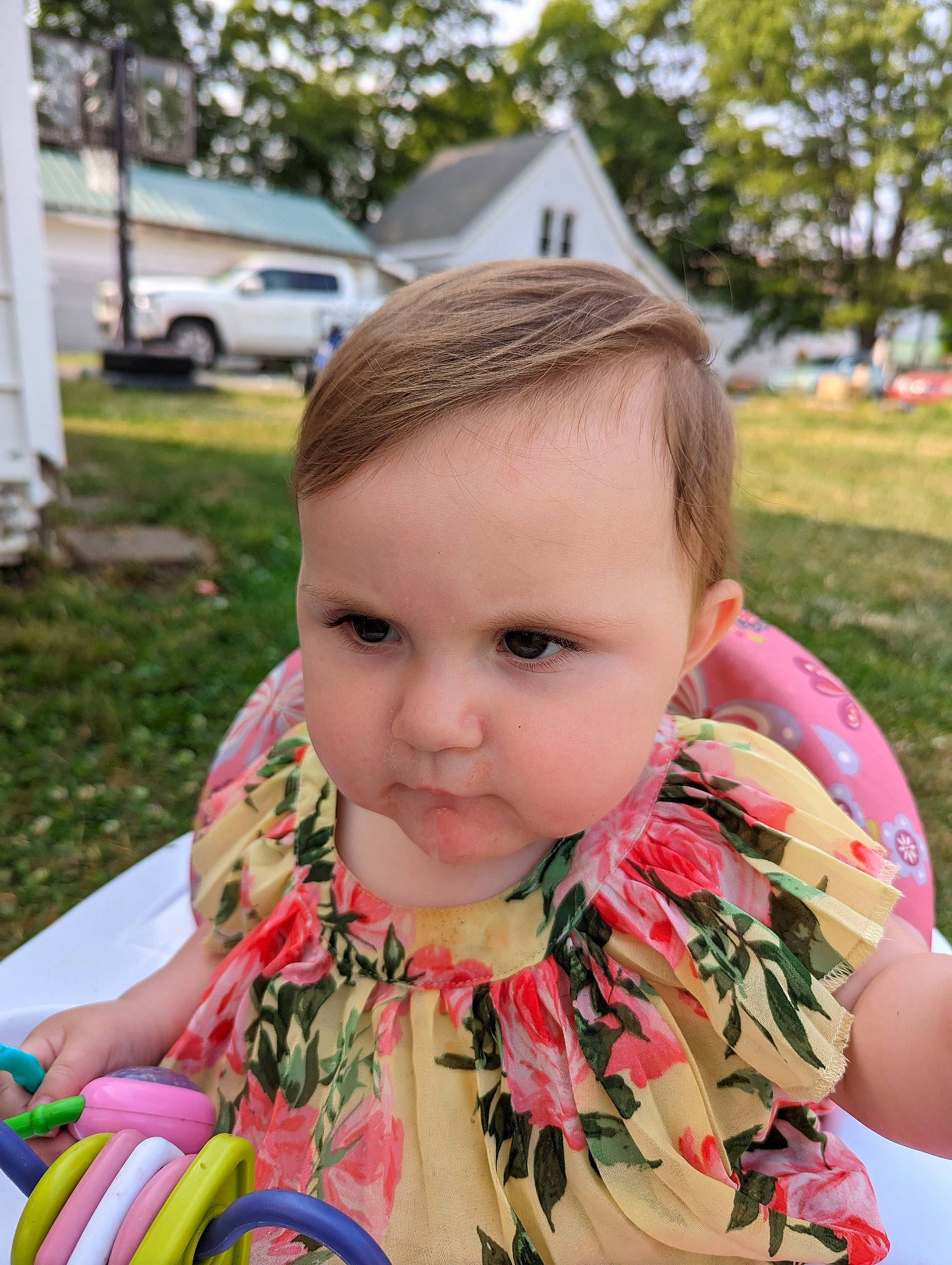 Leona joined the competition — help win amazing prizes! baby, child, face, facial_expression, fun, grass, happy, iris, leisure, lip, neck, people_in_nature, person, pink, plant, recreation, sitting, skin, toddler, tree