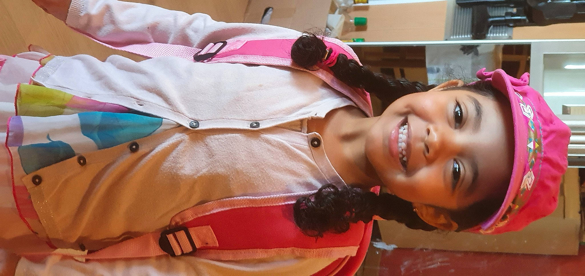 Clélia a rejoint le concours — aidez-le/la à gagner de superbes lots ! abdomen, bangs, black_hair, chest, child, event, eye, eyelash, fashion_accessory, fun, happy, head, headwear, jewellery, joy, neck, orange, person, pink, skin