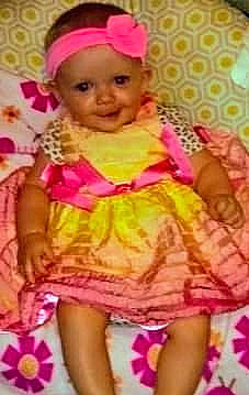 Harmony is registered to the contest to win money with this photo: baby, cheek, child, doll, hair_accessory, joy, magenta, person, pink, smile, textile, toddler