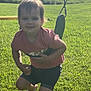 child, toddler, swing, playground, grass, outdoor, summer, sunlight, greenery, smile, barefoot, shorts, tshirt, happy, nature, sky, clouds, play, fun, daytime