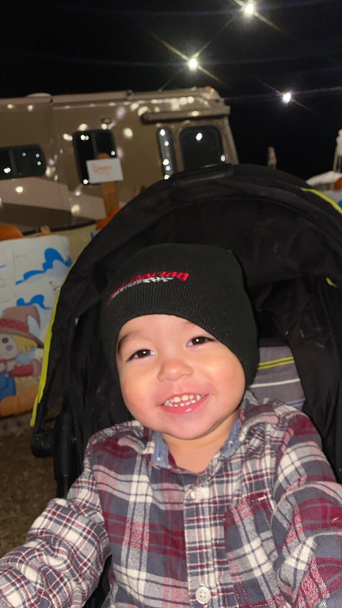 Mateo joined the competition — help win amazing prizes! automotive_design, beanie, cap, child, cool, costume, event, fashion_accessory, flash_photography, fun, happy, headgear, headwear, joy, laugh, luxury_vehicle, pattern, person, personal_protective_equipment, plaid