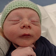 Karson joined the competition — help win amazing prizes! newborn, baby, infant, sleeping, hat, knitted_hat, hand, face, closeup, portrait, peaceful, resting, soft, cute, child, young, indoors, clothing, skin, headwear