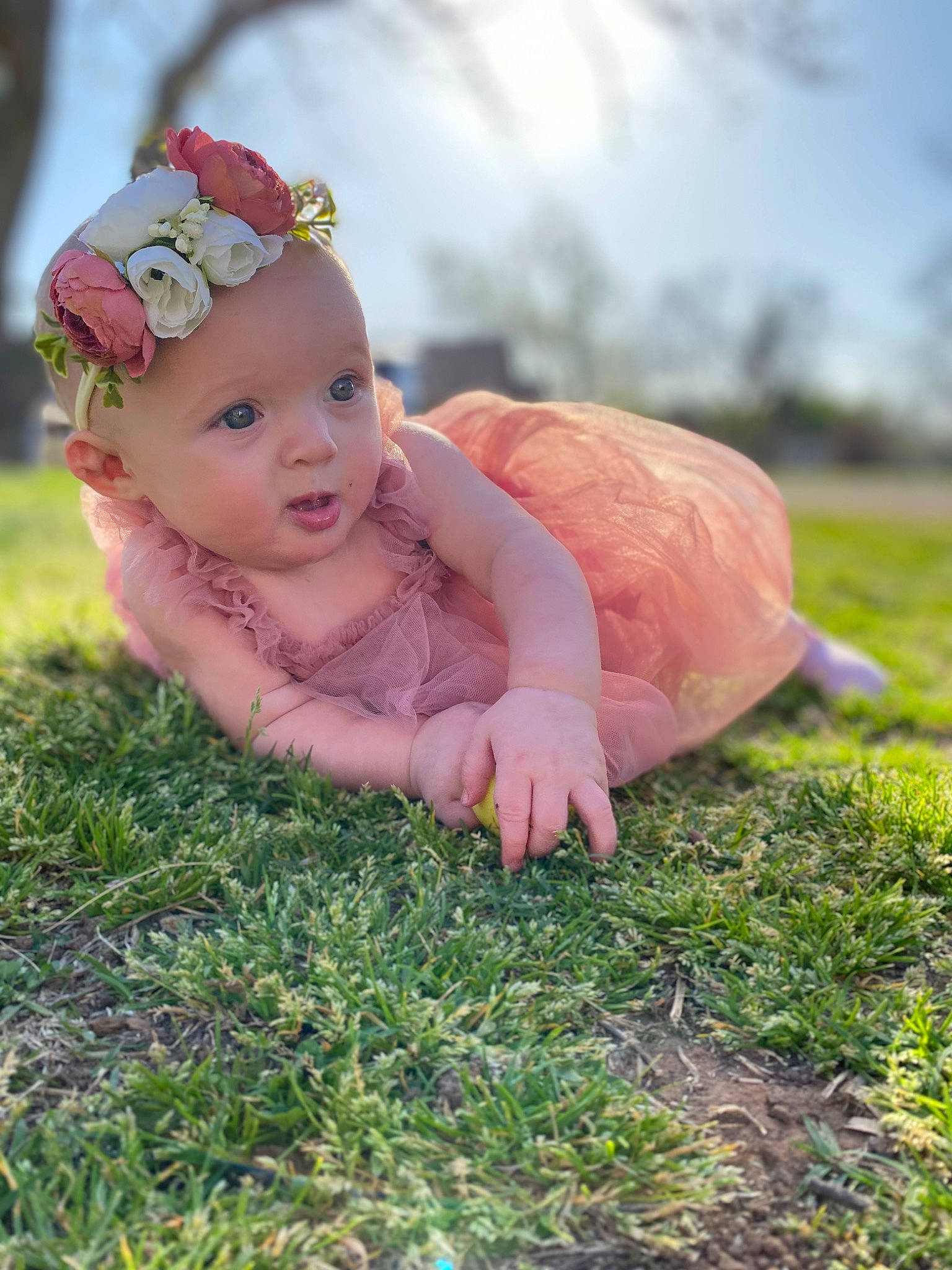 Mattie joined the competition — help win amazing prizes! baby, baby_toddler_clothing, fawn, flash_photography, flower, grass, grassland, happy, headband, headpiece, headwear, leaf, meadow, people_in_nature, person, petal, plant, prairie, skin, sky