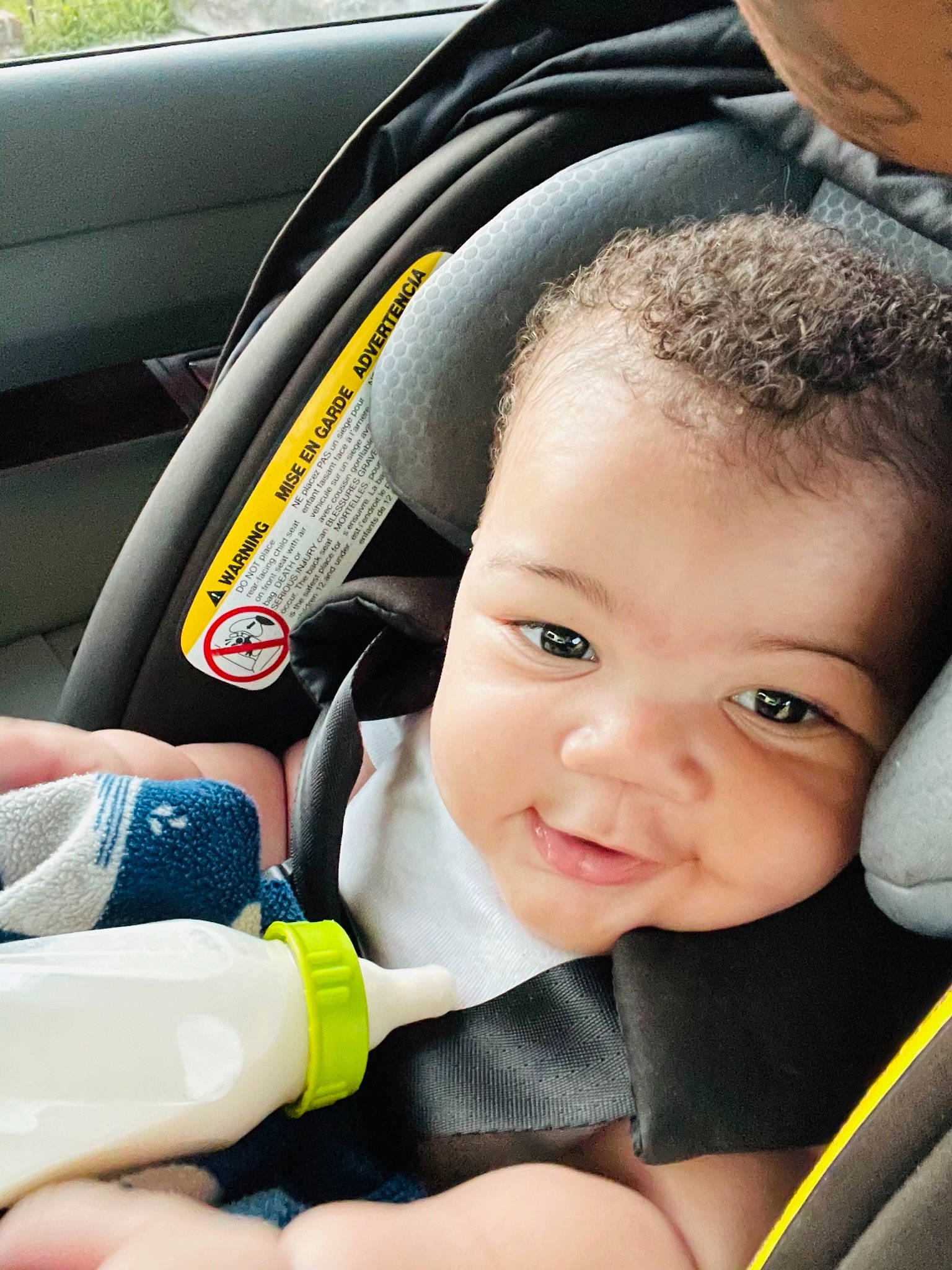 Christian is registered to the contest to win money with this photo: auto_part, automotive_design, baby, baby_carriage, baby_in_car_seat, car, car_seat, car_seat_cover, child, comfort, happy, motor_vehicle, person, product, seat_belt, smile, steering_part, steering_wheel, toddler, vehicle_door