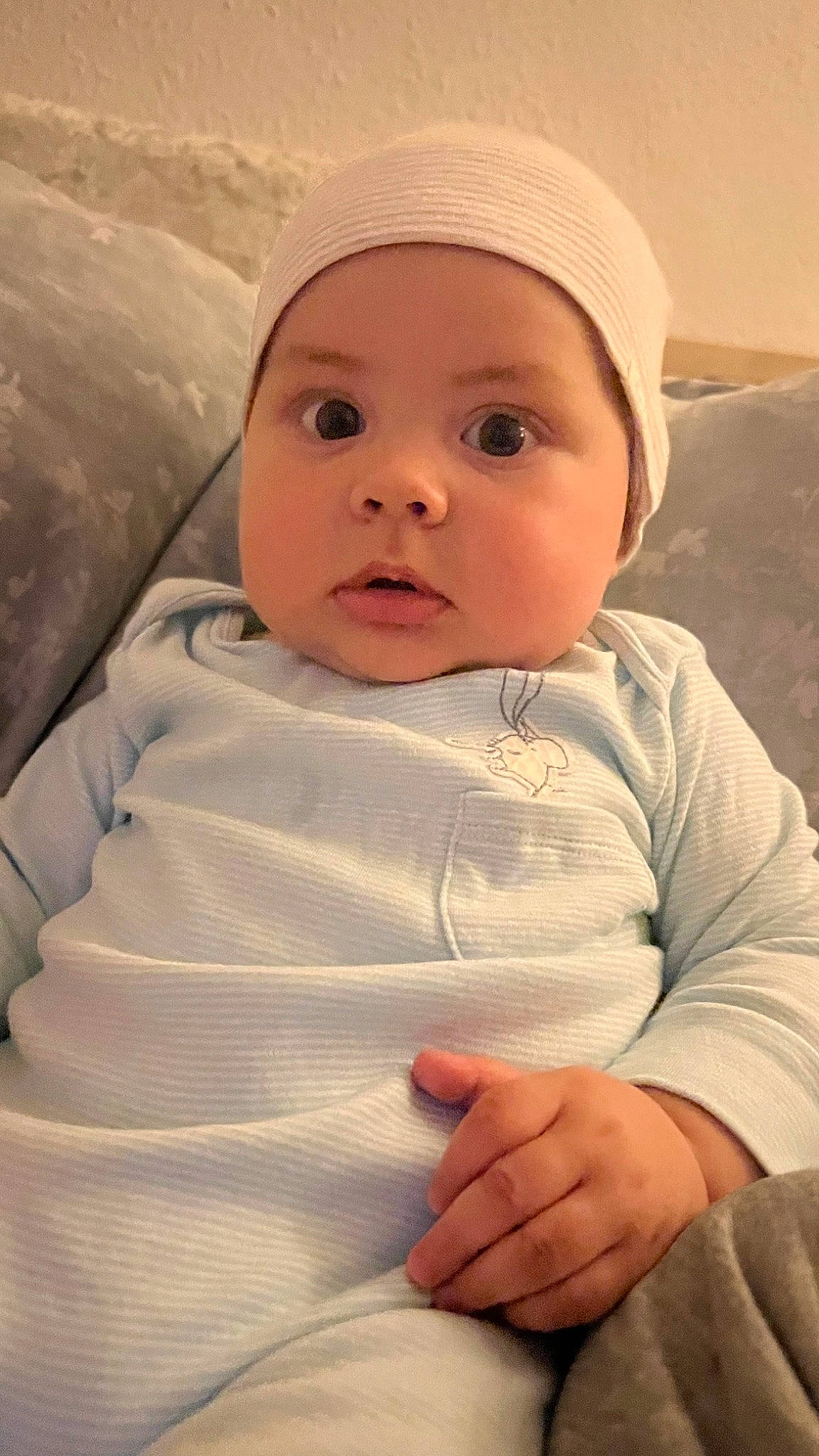 Filip joined the competition — help win amazing prizes! baby, baby_toddler_clothing, cap, cheek, child, chin, comfort, eye, eyebrow, facial_expression, finger, happy, headgear, headwear, iris, linens, lip, nose, person, skin