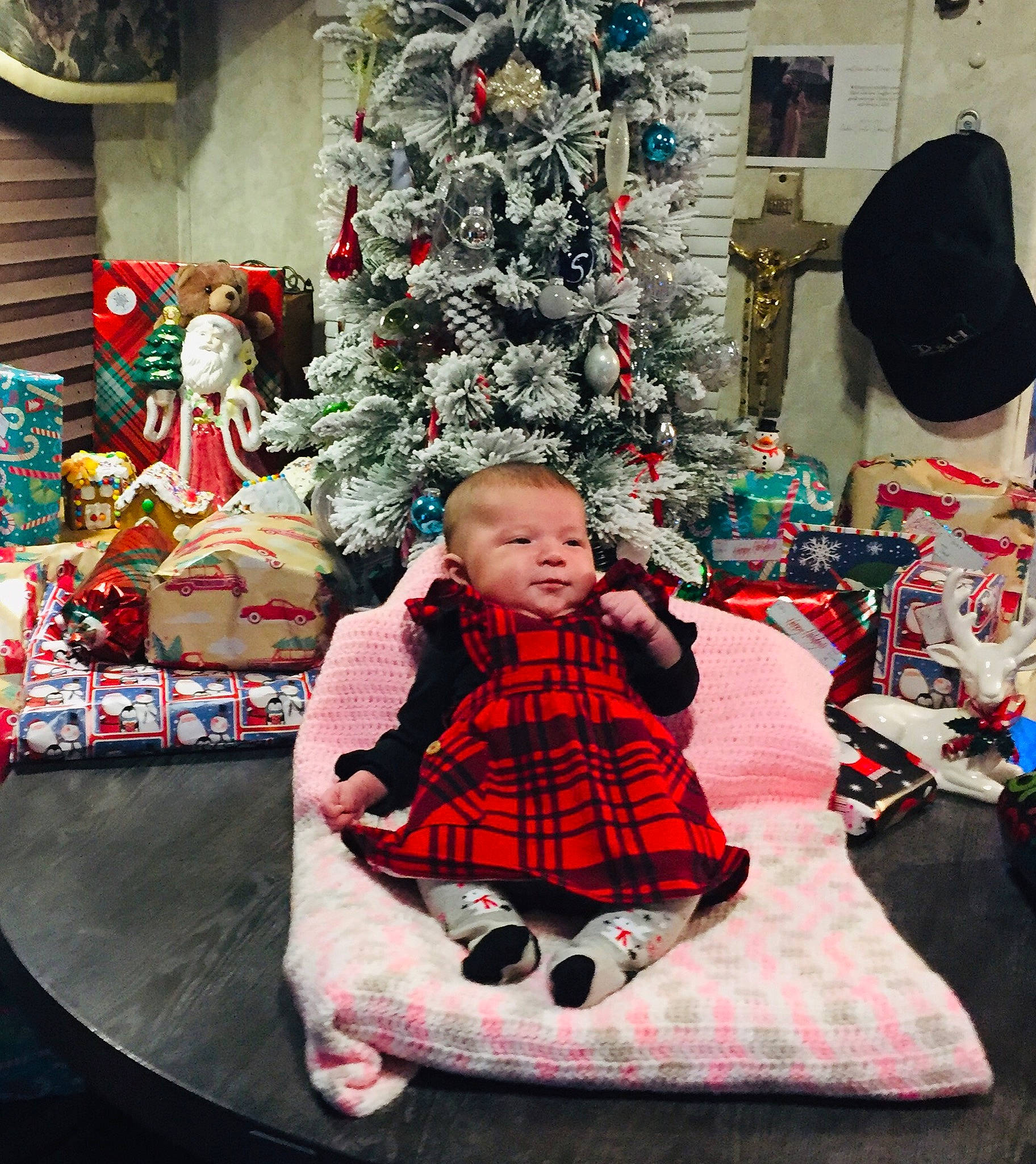 Amethyst is registered to the contest to win money with this photo: baby_toddler_clothing, christmas, christmas_decoration, christmas_eve, christmas_ornament, christmas_tree, event, fun, holiday, holiday_ornament, lap, ornament, pattern, person, plaid, sleeve, tartan, toddler, tree, winter