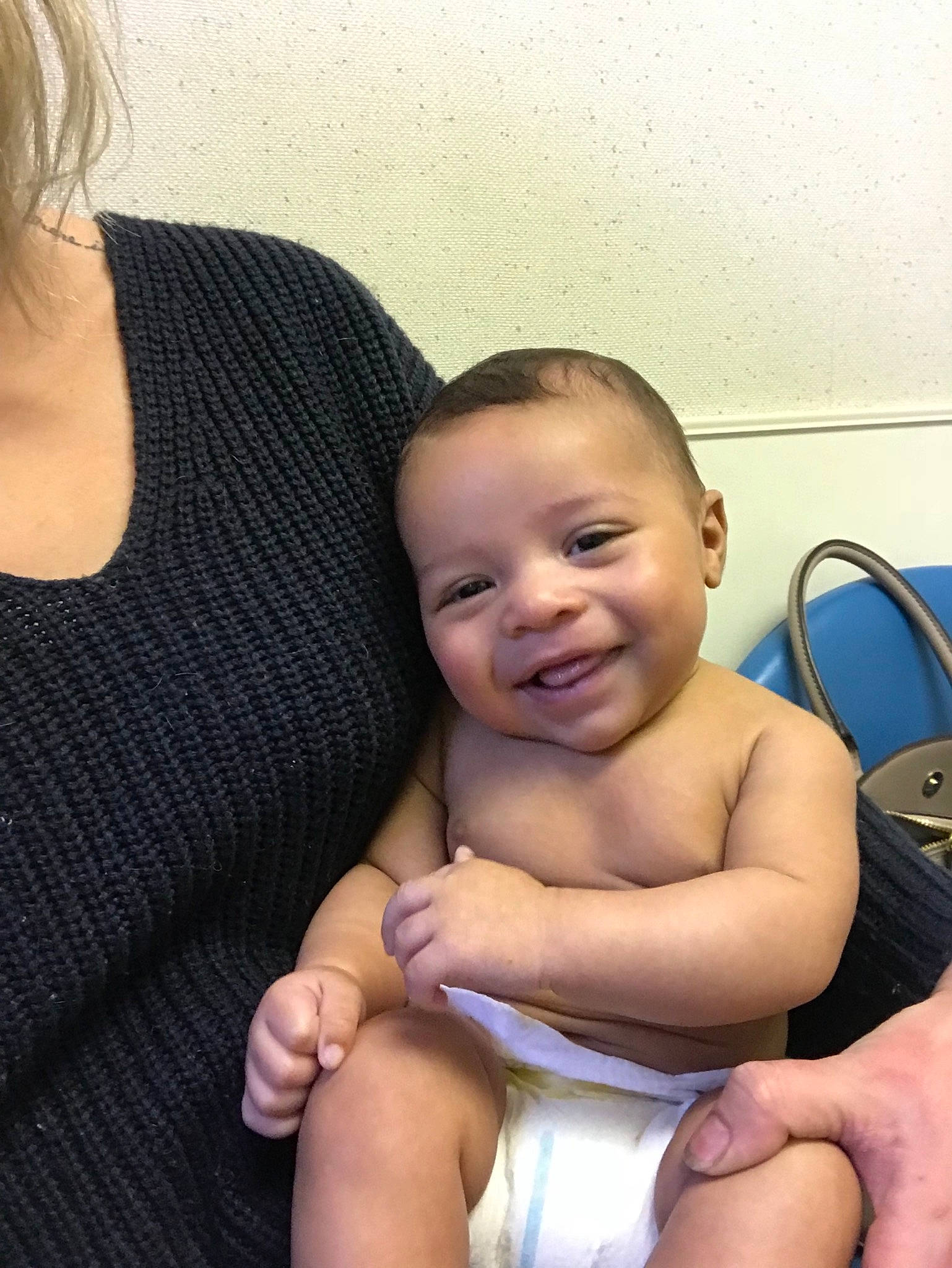 Dash is registered to the contest to win money with this photo: baby, child, leg, mother, person, product, sitting, skin, smile, toddler