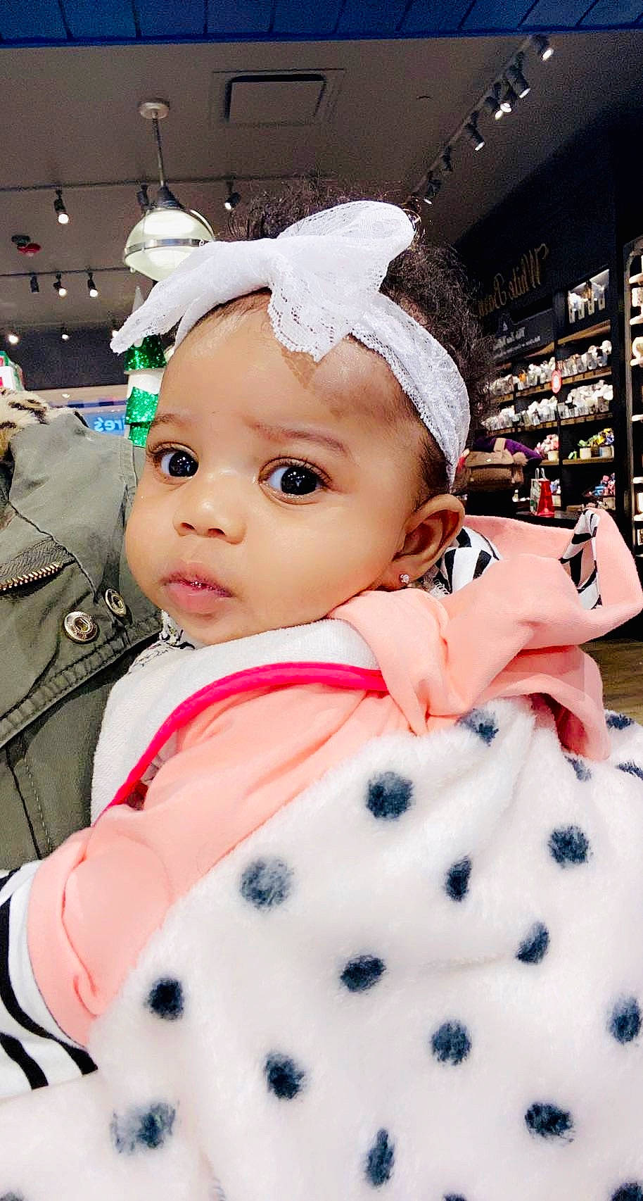 Cailee joined the competition — help win amazing prizes! baby, baby_toddler_clothing, cap, cheek, child, costume_hat, event, eyelash, fashion_accessory, fur, happy, headband, headpiece, pattern, person, pink, skin, sleeve, textile, toddler