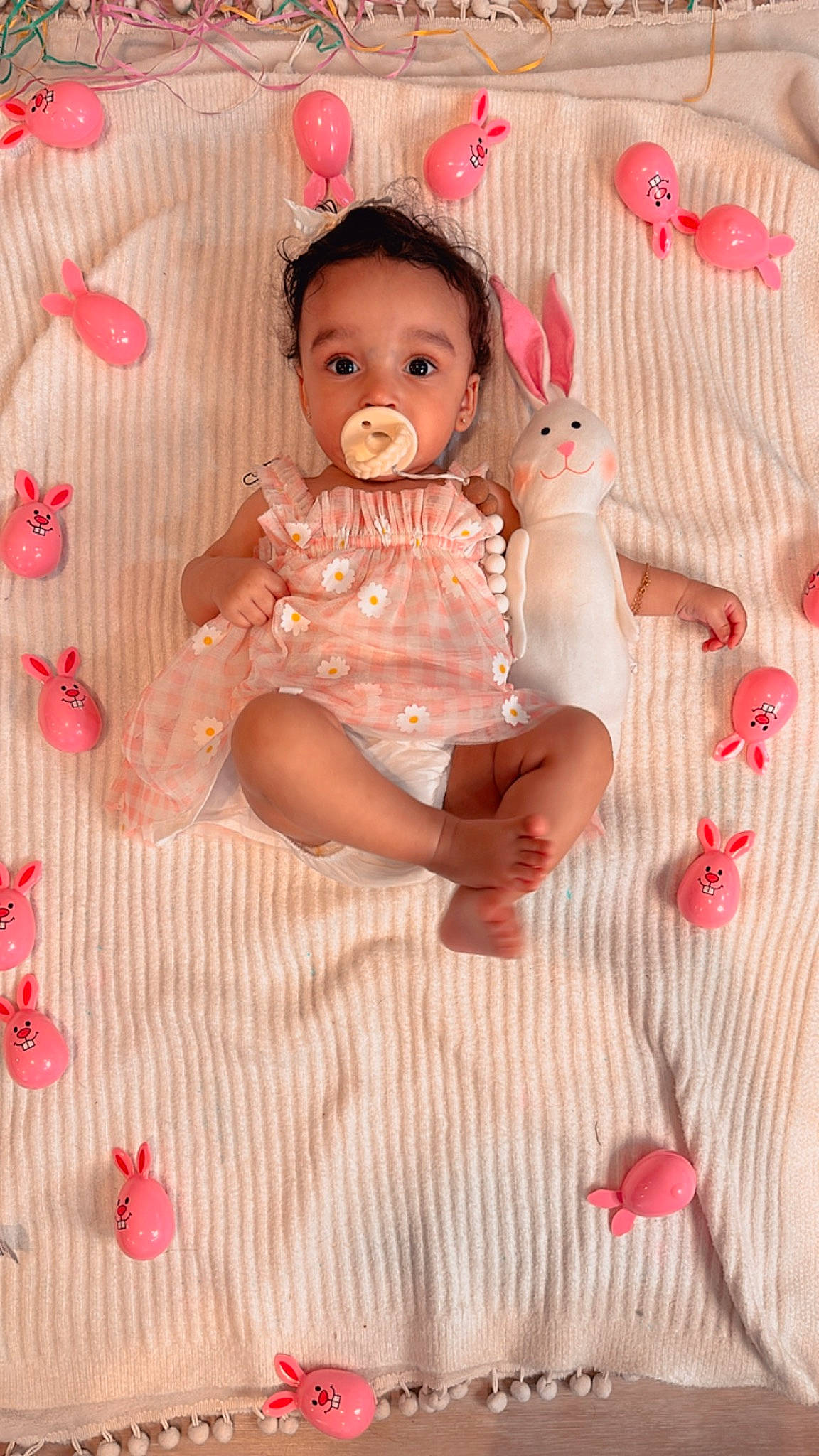 Kallie joined the competition — help win amazing prizes! arm, baby, baby_toddler_clothing, cheek, child, dress, eye, face, fawn, hand, happy, head, pattern, peach, person, pink, skin, sleeve, textile, toddler