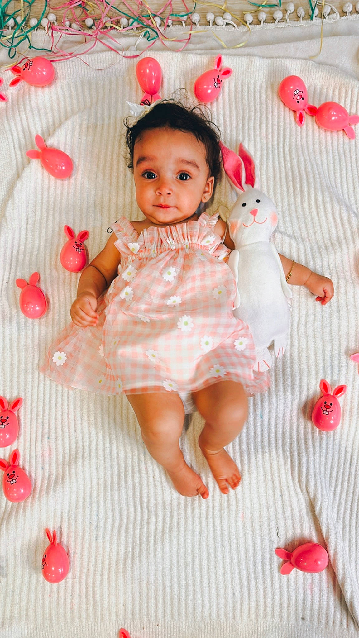 Kallie is registered to the contest to win money with this photo: baby, baby_toddler_clothing, cheek, child, dress, embellishment, face, finger, happy, magenta, one_piece_garment, pattern, peach, person, pink, product, red, skin, sleeve, textile