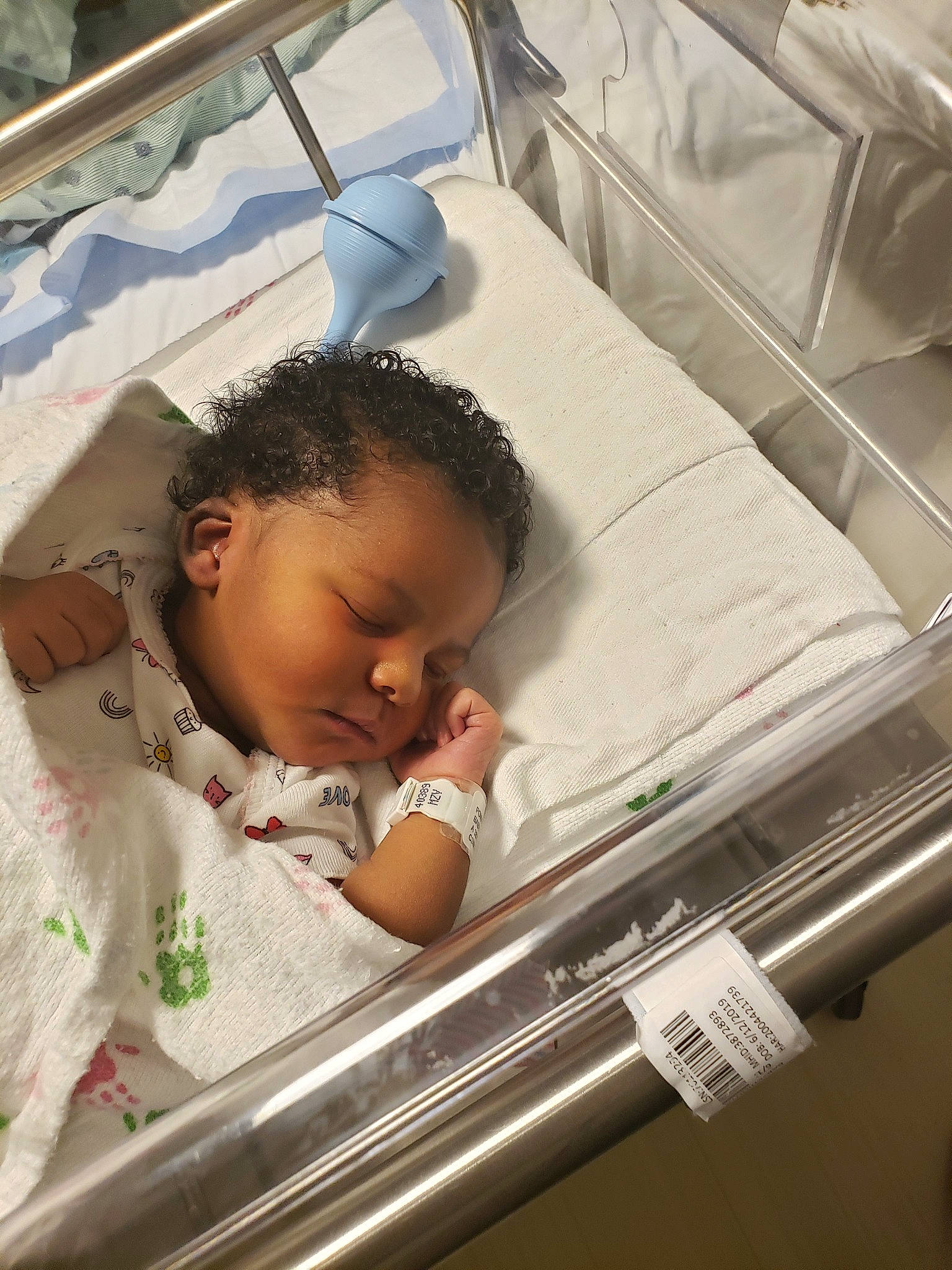 Anissa is registered to the contest to win money with this photo: baby, baby_products, baby_safety, baby_sleeping, bed, bedtime, birth, child, childbirth, hospital, hospital_bed, infant_bed, nap, person, product, sleep, toddler