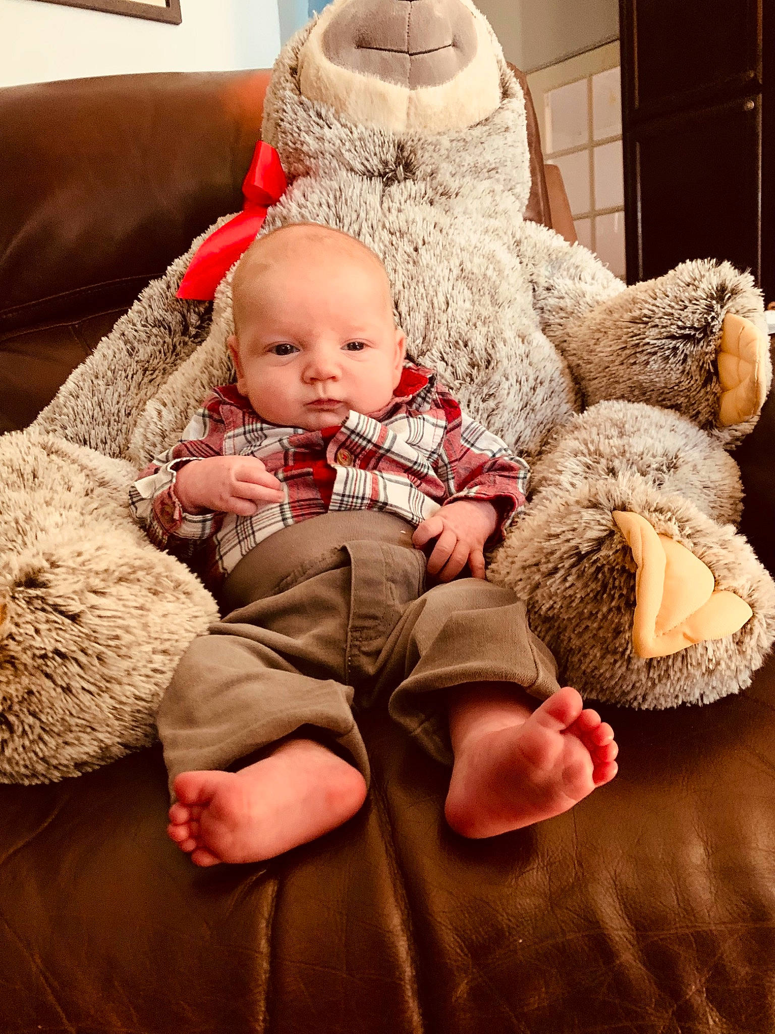Nikolai joined the competition — help win amazing prizes! baby, baby_toddler_clothing, cheek, child, comfort, couch, event, facial_expression, foot, fur, fur_clothing, lap, outerwear, person, room, santa_claus, sitting, skin, textile, toddler