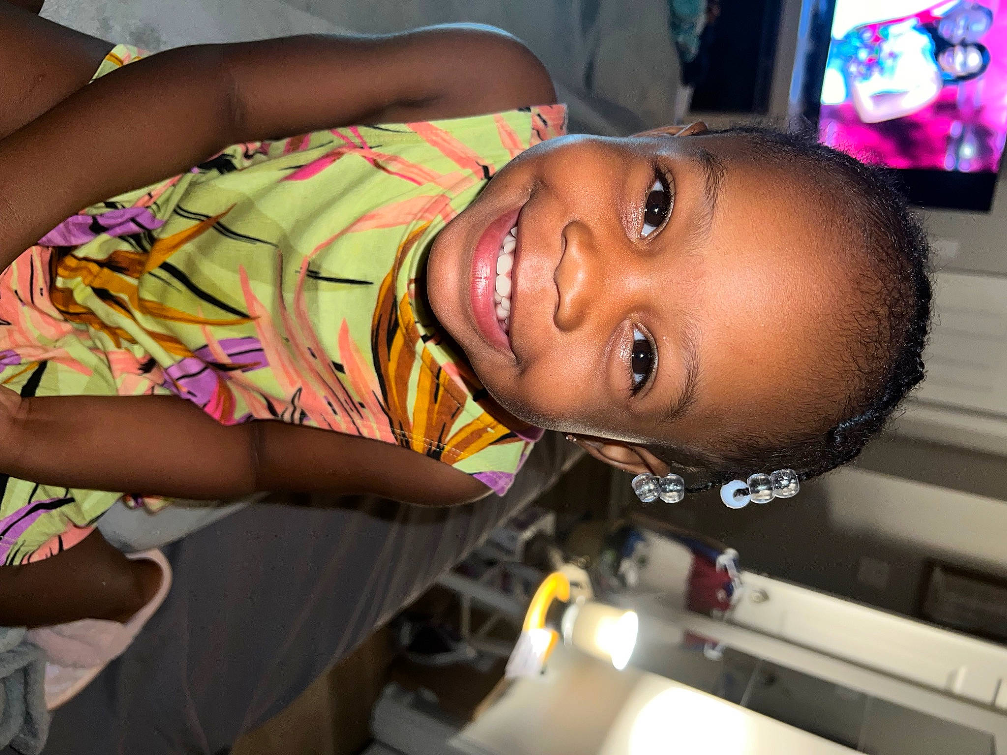 Hannah C. Wilks is registered to the contest to win money with this photo: audio_equipment, black_hair, chest, child, display_device, flat_panel_display, fun, happy, home_appliance, joy, led_backlit_lcd_display, mouth, party, person, room, skin, smile, t_shirt, television, television_set