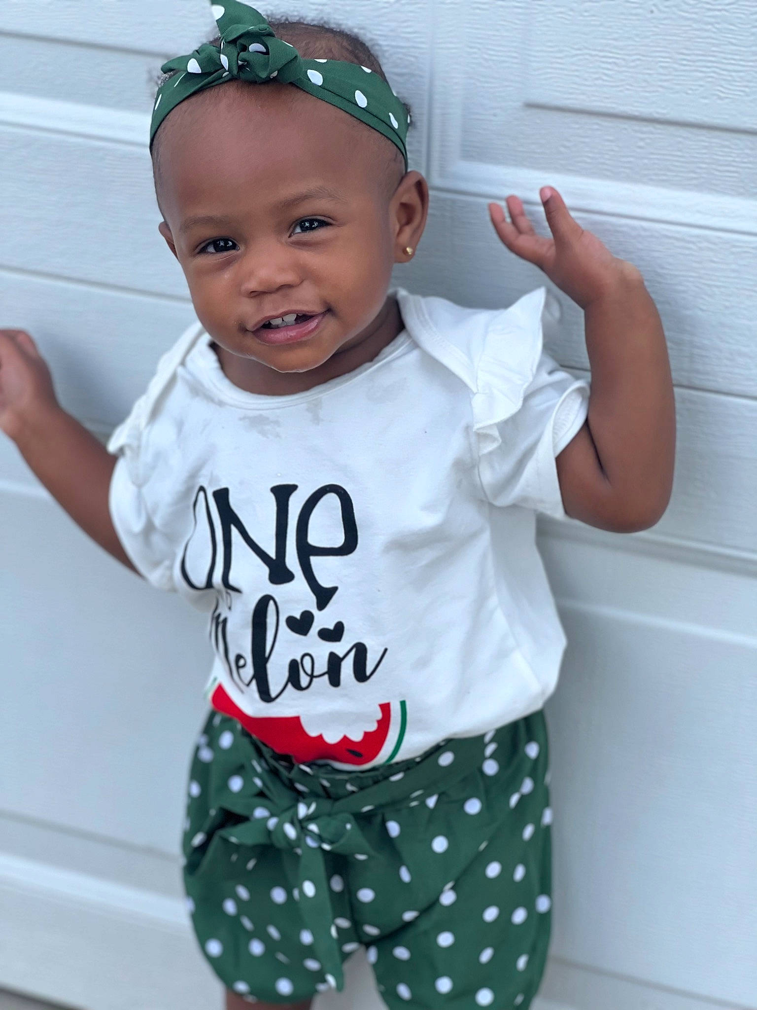 Hannah C. Wilks joined the competition — help win amazing prizes! baby, baby_toddler_clothing, cap, child, cool, eyewear, facial_expression, fashion_accessory, fun, gesture, green, happy, pattern, person, play, sleeve, t_shirt, toddler, top, white
