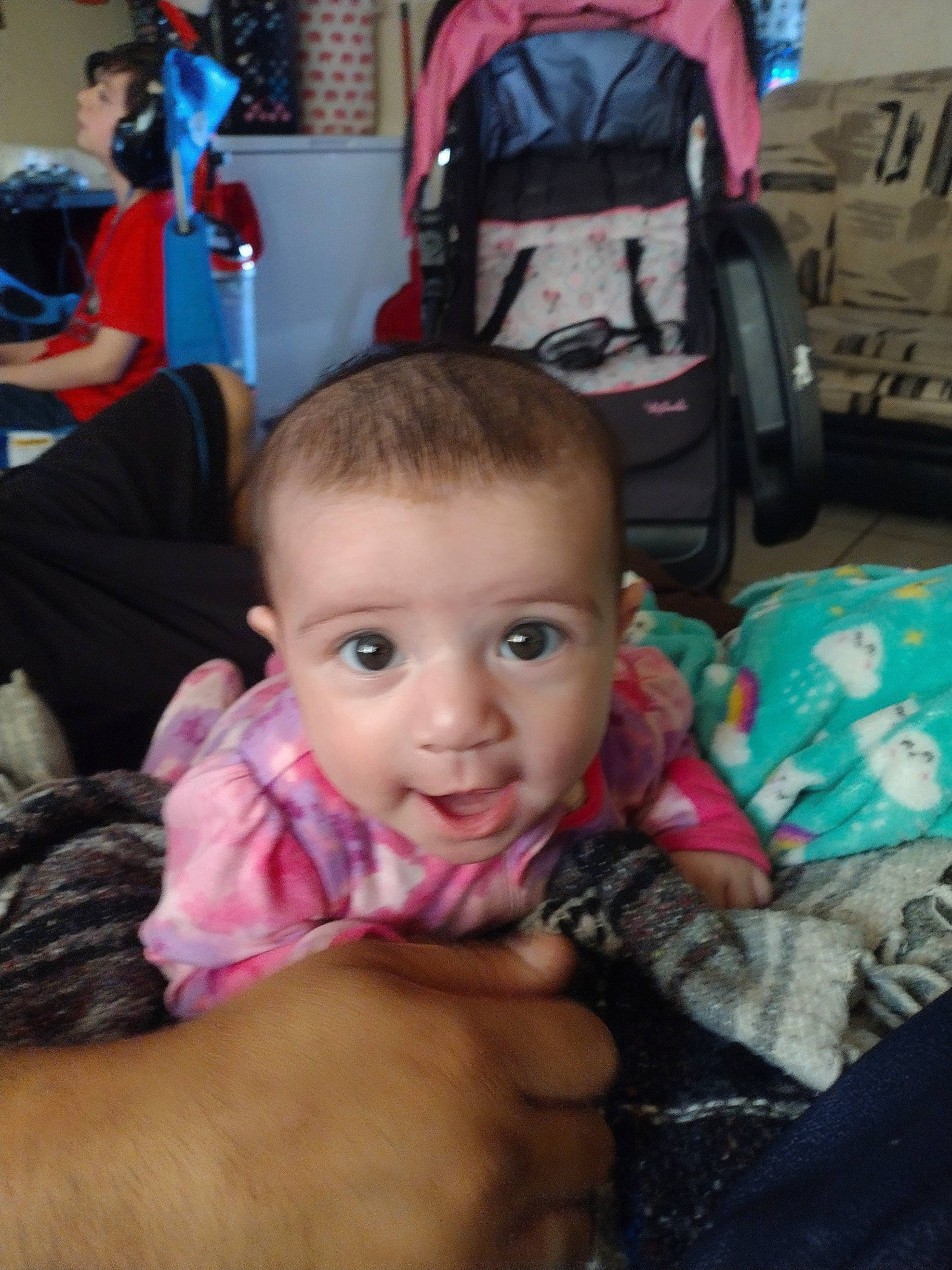 Riley joined the competition — help win amazing prizes! baby, backpack, bag, baggage, chair, cheek, child, comfort, event, fun, gesture, happy, lap, luggage_and_bags, nail, person, room, sitting, smile, thumb