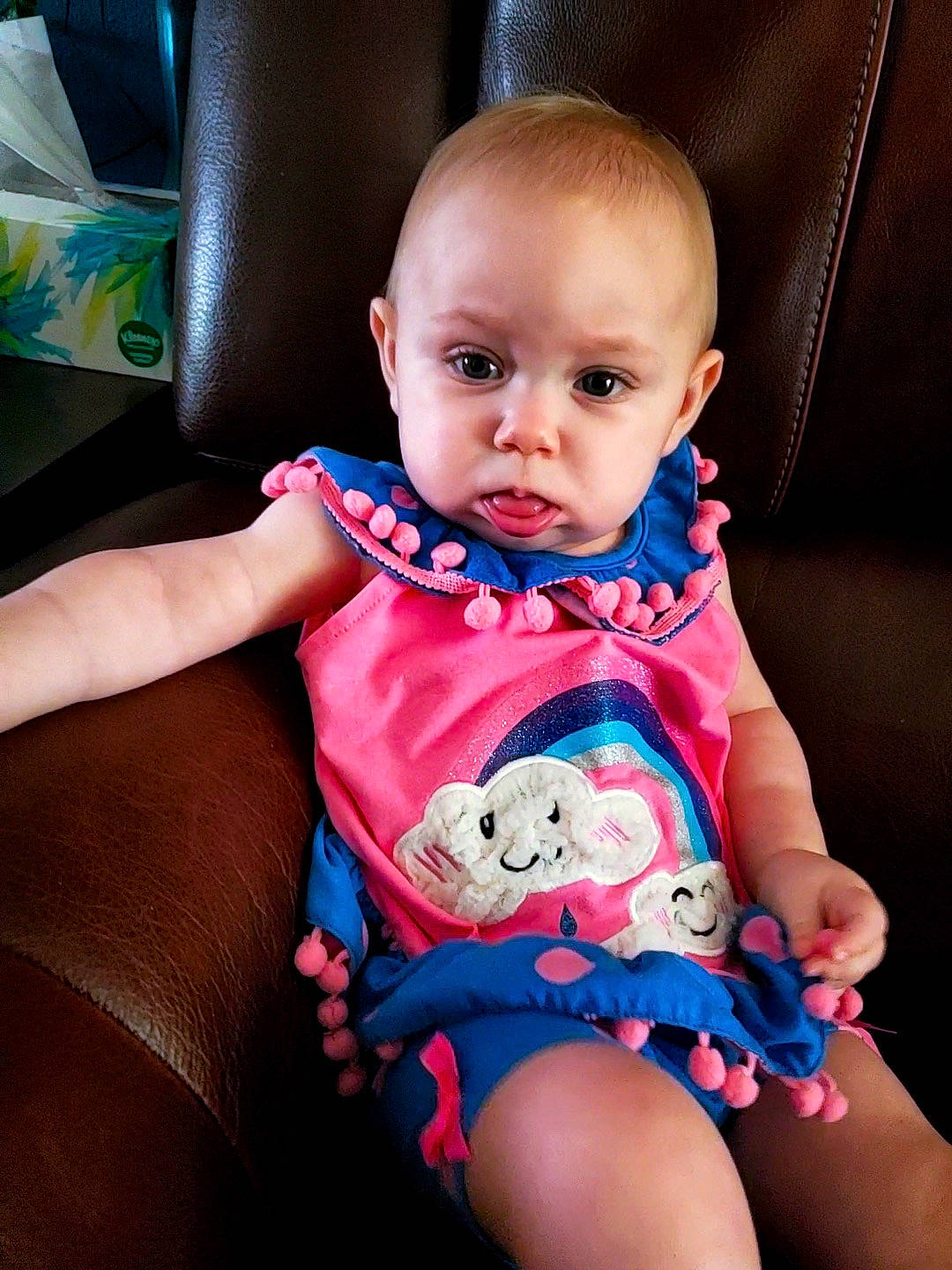 Keira is registered to the contest to win money with this photo: arm, baby, baby_toddler_clothing, cheek, cool, dress, eye, green, happy, head, iris, mouth, neck, one_piece_garment, person, pink, product, shoulder, skin, sleeve